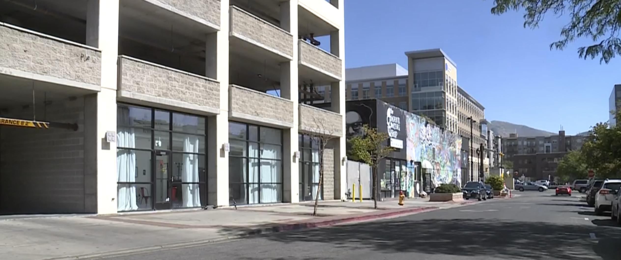 Three men face charges tying them to the shooting and killing of a man inside the Exchange Place parking structure in downtown Salt Lake City in 2018, but none is charged with murder. 