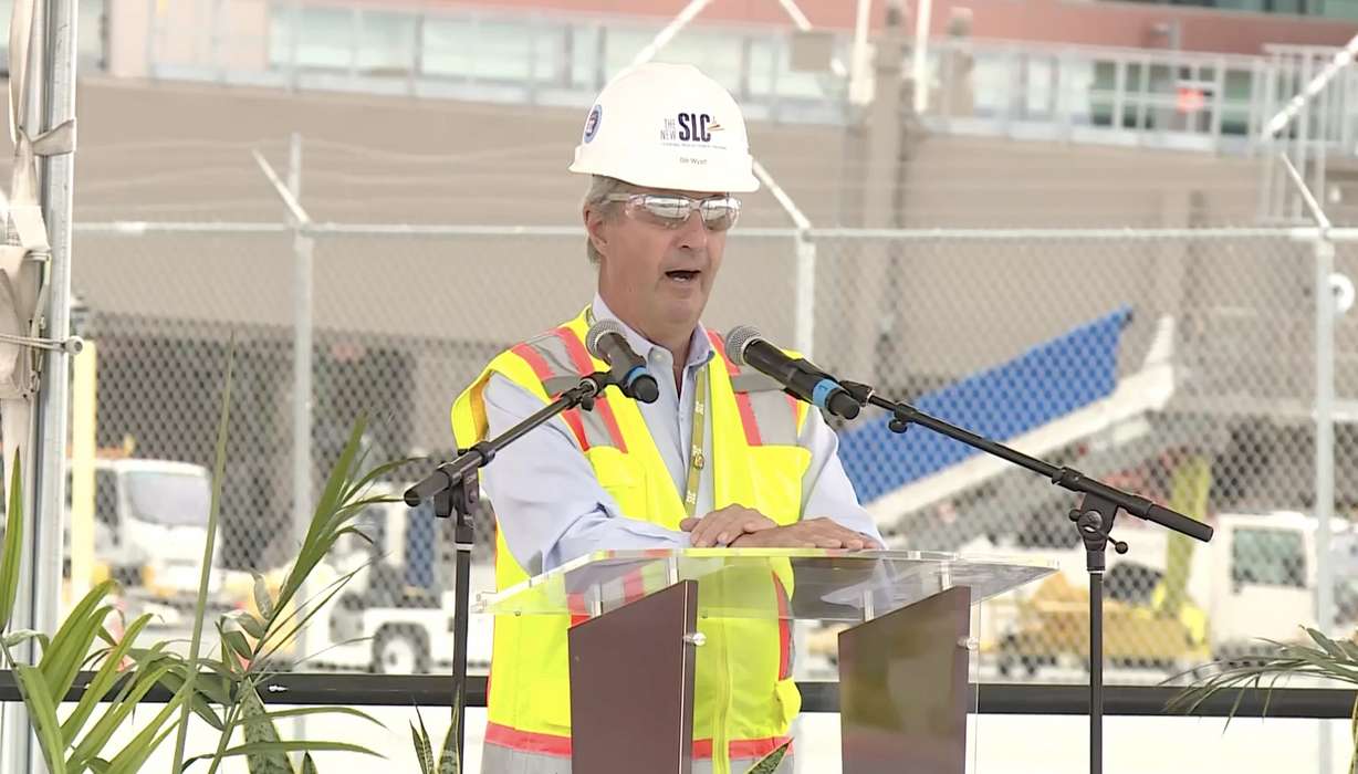 Bill Wyatt, the executive director of the Salt Lake City International Airport, speaks at a ceremony Tuesday morning celebrating the two-year anniversary of the new airport. The airport is planning to add more gates in the near future.
