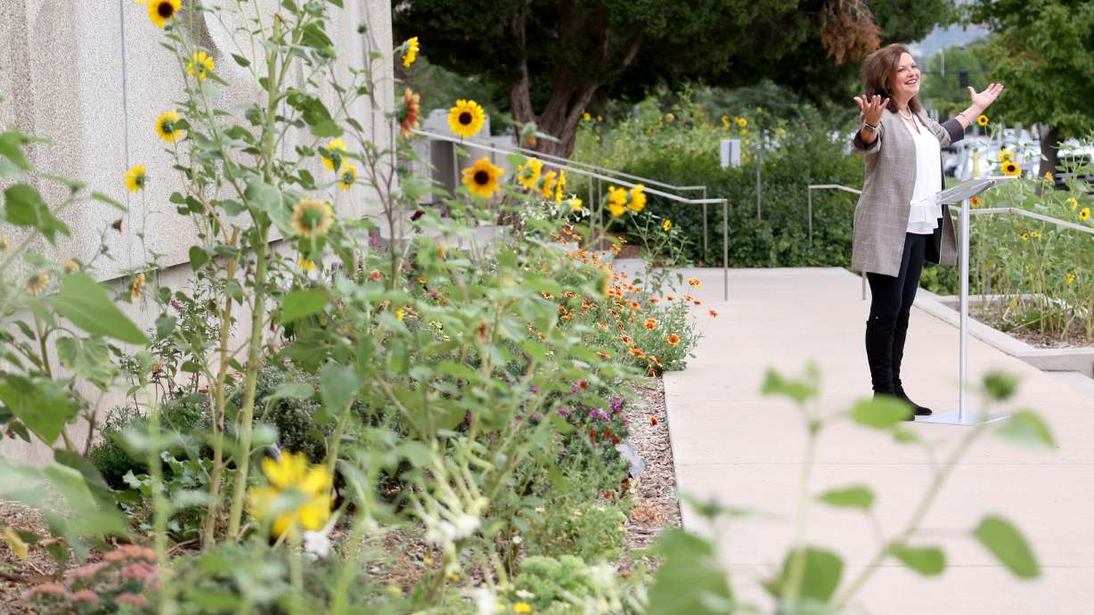 Heidi Kuhn, Roots of Peace founder, speaks during an unveiling ceremony for The Leonardo Peace Garden in Salt Lake City on Tuesday.