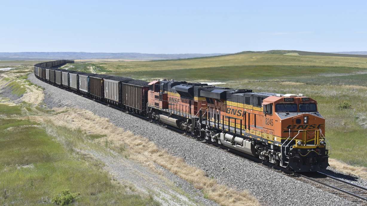 A BNSF railroad train hauling carloads of coal from the Powder River Basin of Montana and Wyoming is seen east of Hardin, Mont., on July 15, 2020. Business and top officials are bracing for the possibility of a nationwide rail strike on Friday while talks continue between the nation's largest freight railroads and their unions.