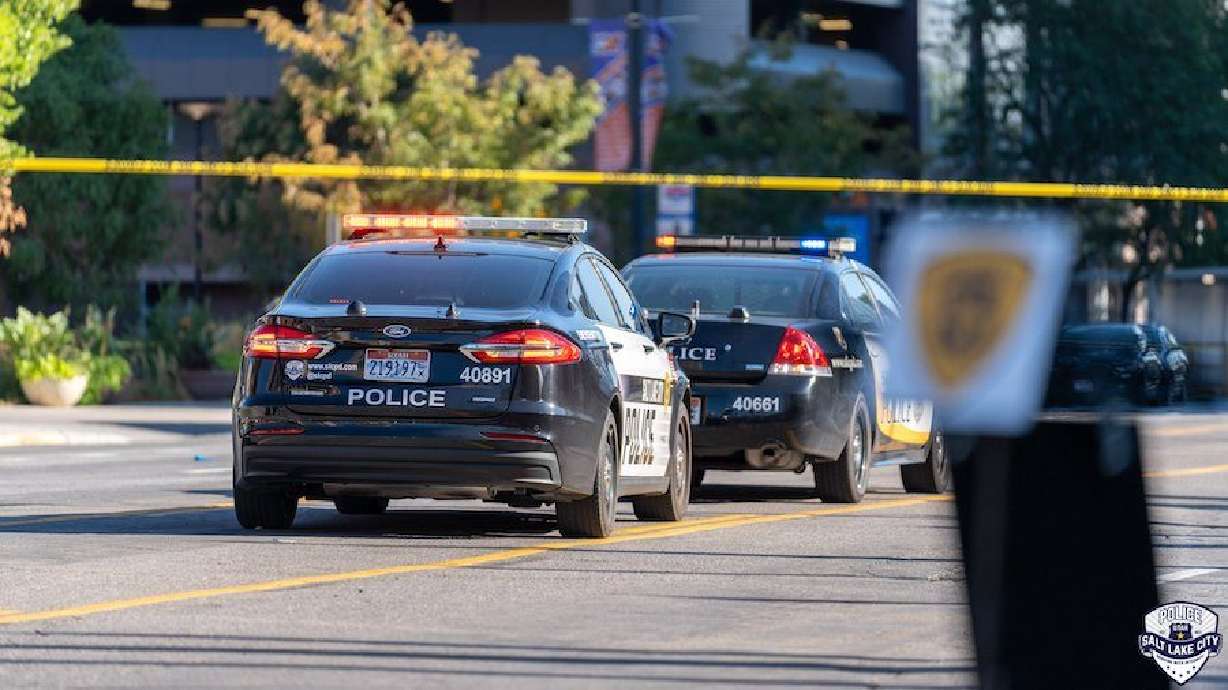 Salt Lake police respond to a shooting at the Salt Palace Convention Center in 2022. One of three men charged in the killing pleaded guilty on Wednesday, while the others are scheduled for a jury trial later this month.