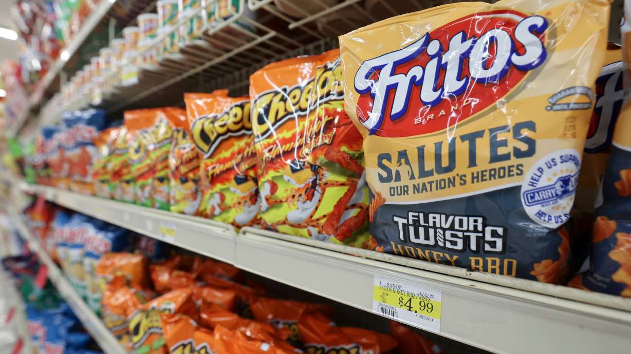 Chips are pictured at a Reams in Sandy on May 18. The overall costs of goods and services may have eased a bit in August, according to the latest U.S. inflation report, but food remains a pricey outlier and just saw the biggest year-over-year jump in more than four decades.