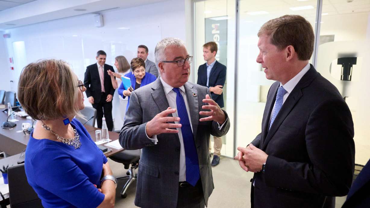 Bishop L. Todd Budge, right, of the Presiding Bishopric, visits with World Food Programme Deputy Executive Director Ute Klamert, left. The Church of Jesus Christ of Latter-day Saints donated $1.02 billion helping others last year.