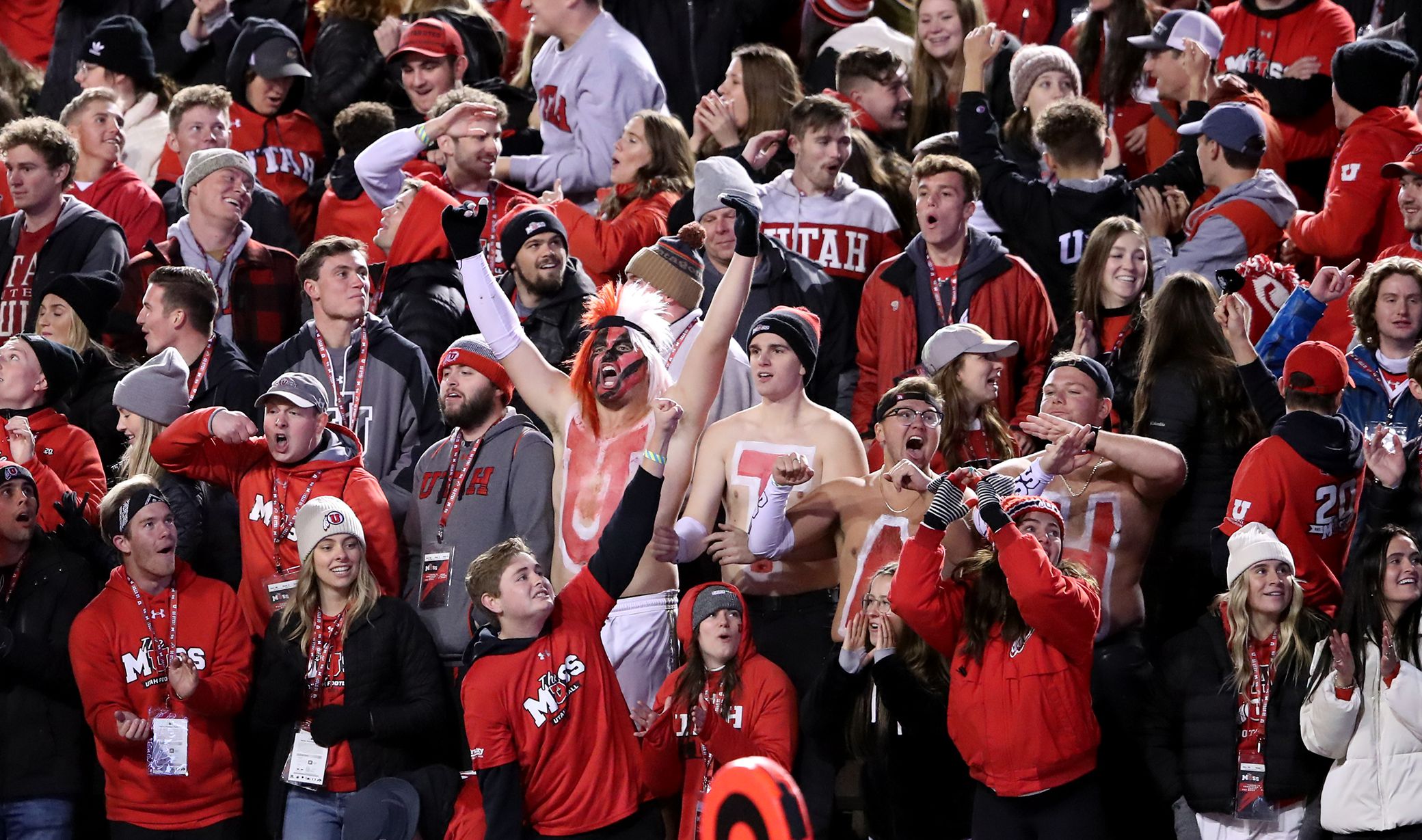 Utah fans cheer after a Utah score as Utah and Oregon play an NCAA football game at Rice-Eccles Stadium in Salt Lake City on Nov. 20, 2021. After two female students entered the stadium during last weekend’s football game wearing body paint as tops, the university has announced new game-day protocols.