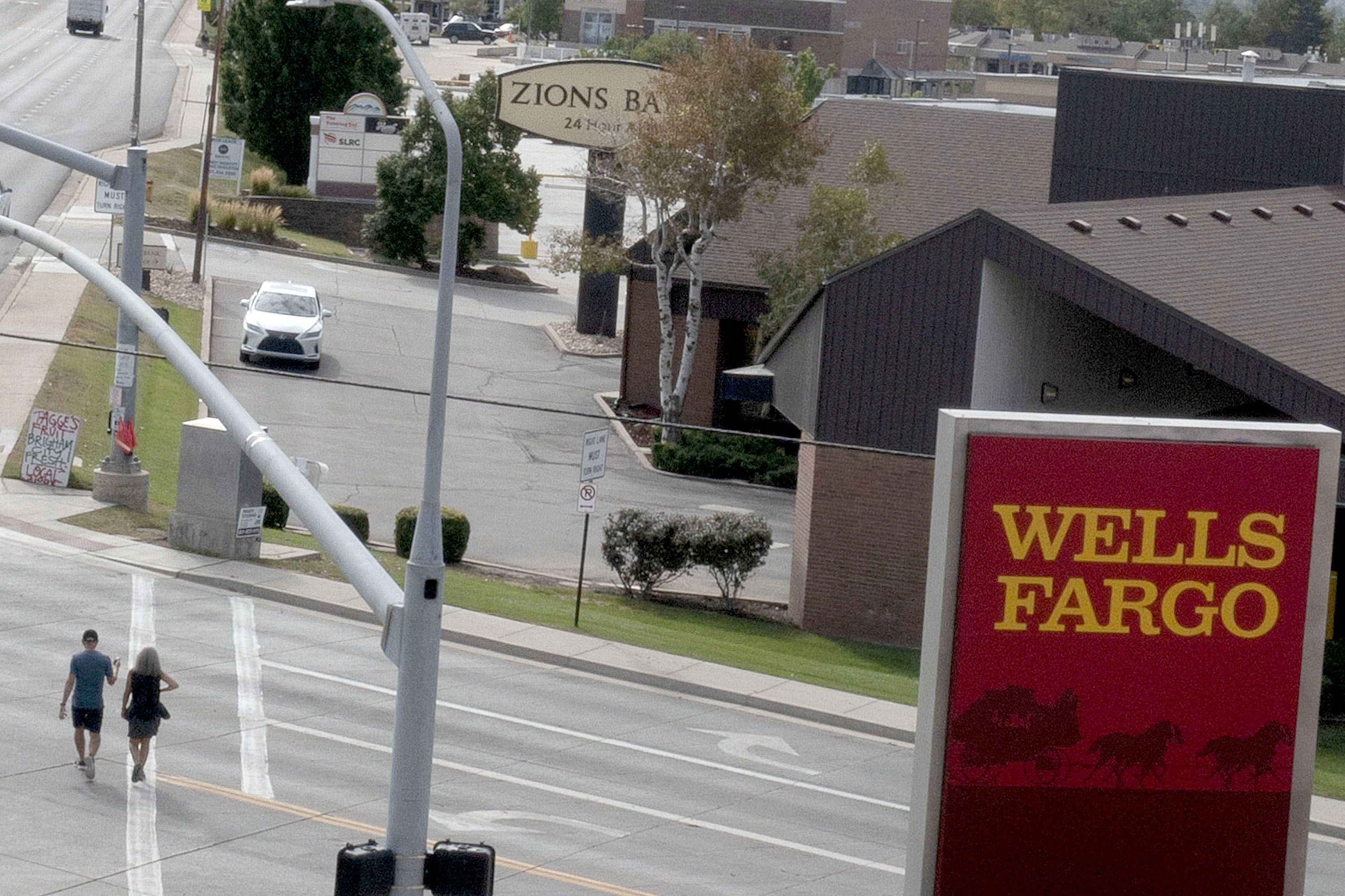 A Wells Fargo and a Zions Bank are pictured on Foothill Drive in Salt Lake City on Thursday. Mortgages rates have hit their highest point since 2008, impacting Utah’s housing market.