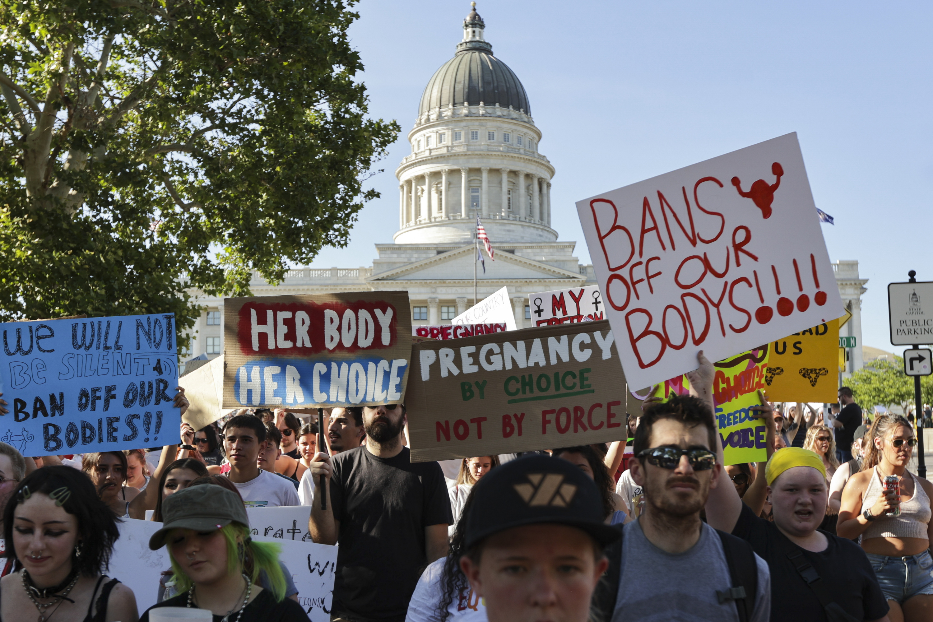 Hundreds of protesters walk from the Capitol to Washington Square Park in Salt Lake City on June 26 after the Supreme Court overturned Roe v. Wade. Some abortion providers and funders in the Beehive State were hit Thursday with cease-and-desist letters from a coalition of Utah legislators, warning them that "abortion is still a crime in Utah."