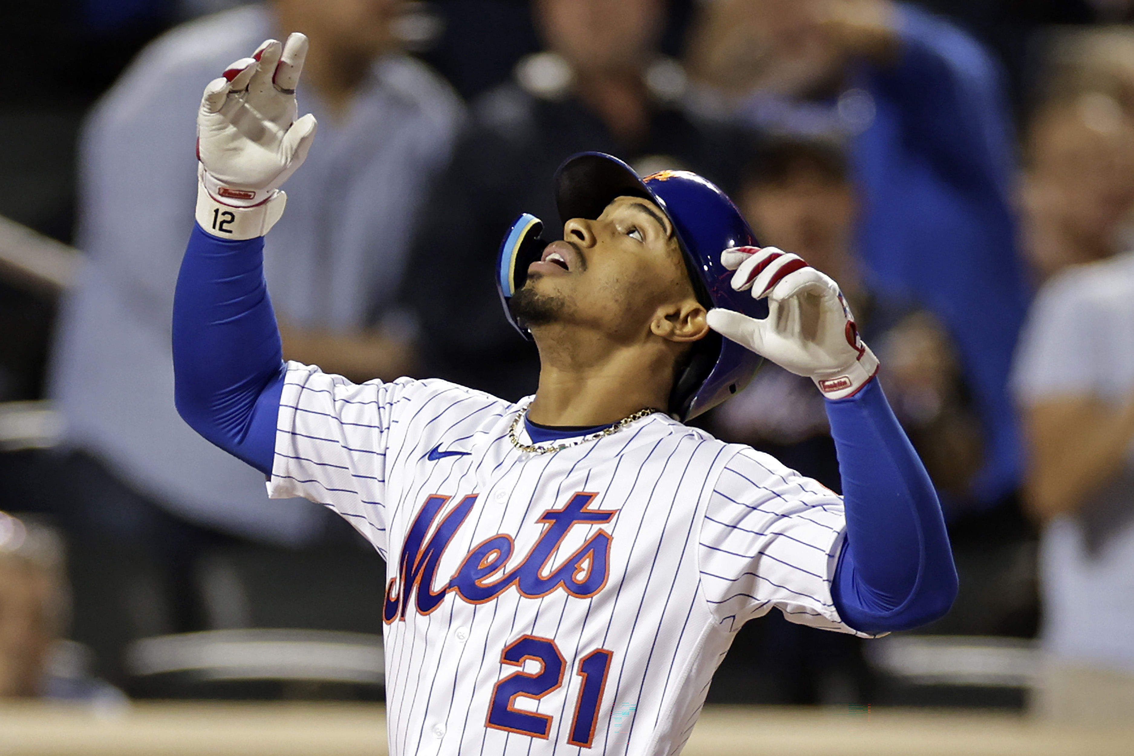 New York Mets' Francisco Lindor reacts after hitting a two-run home run against the Pittsburgh Pirates during the third inning of a baseball game Thursday, Sept. 15, 2022, in New York. 
