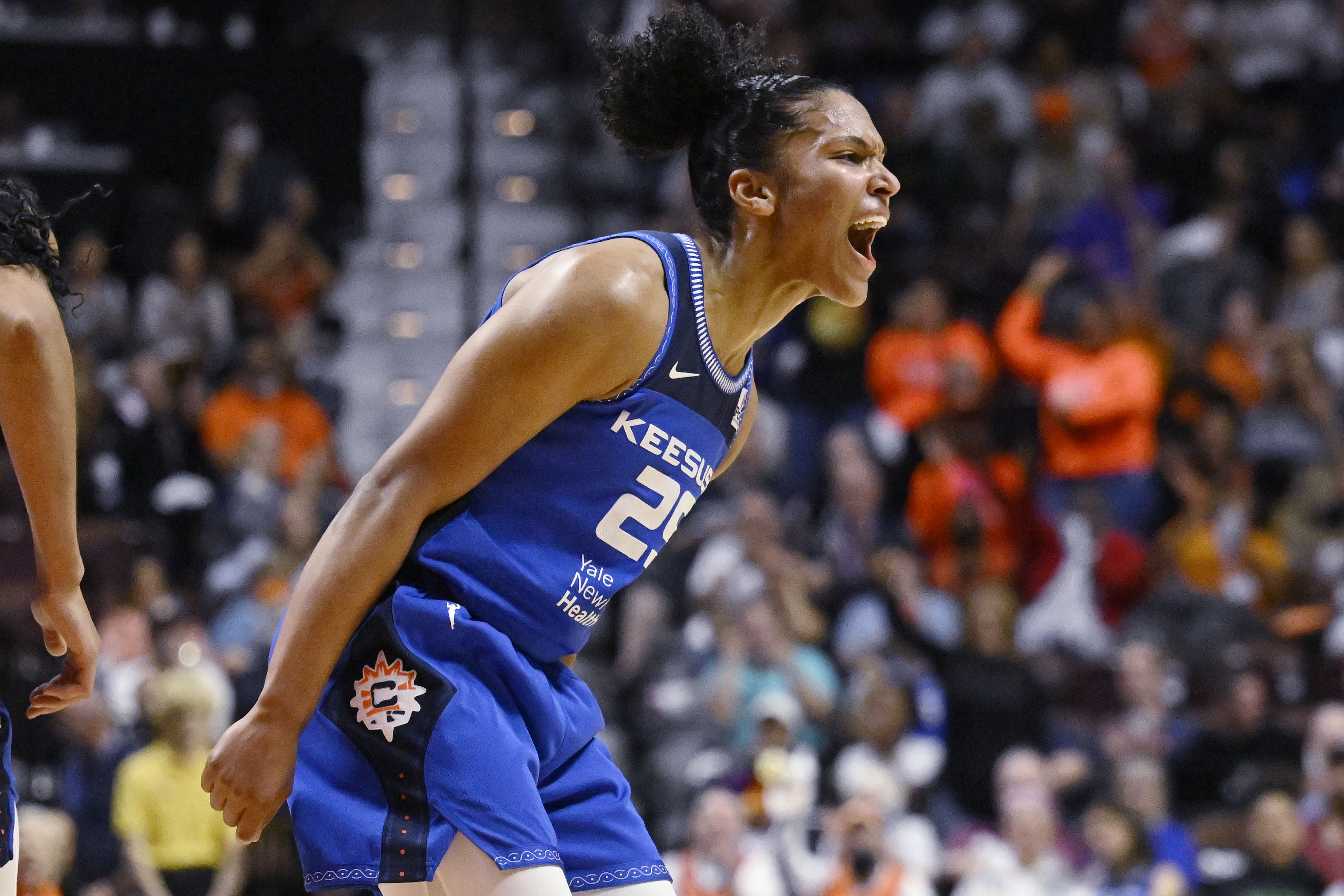 Connecticut Sun's Alyssa Thomas reacts during the first half in Game 3 of a WNBA basketball final playoff series against the Las Vegas Aces, Thursday, Sept. 15, 2022, in Uncasville, Conn.