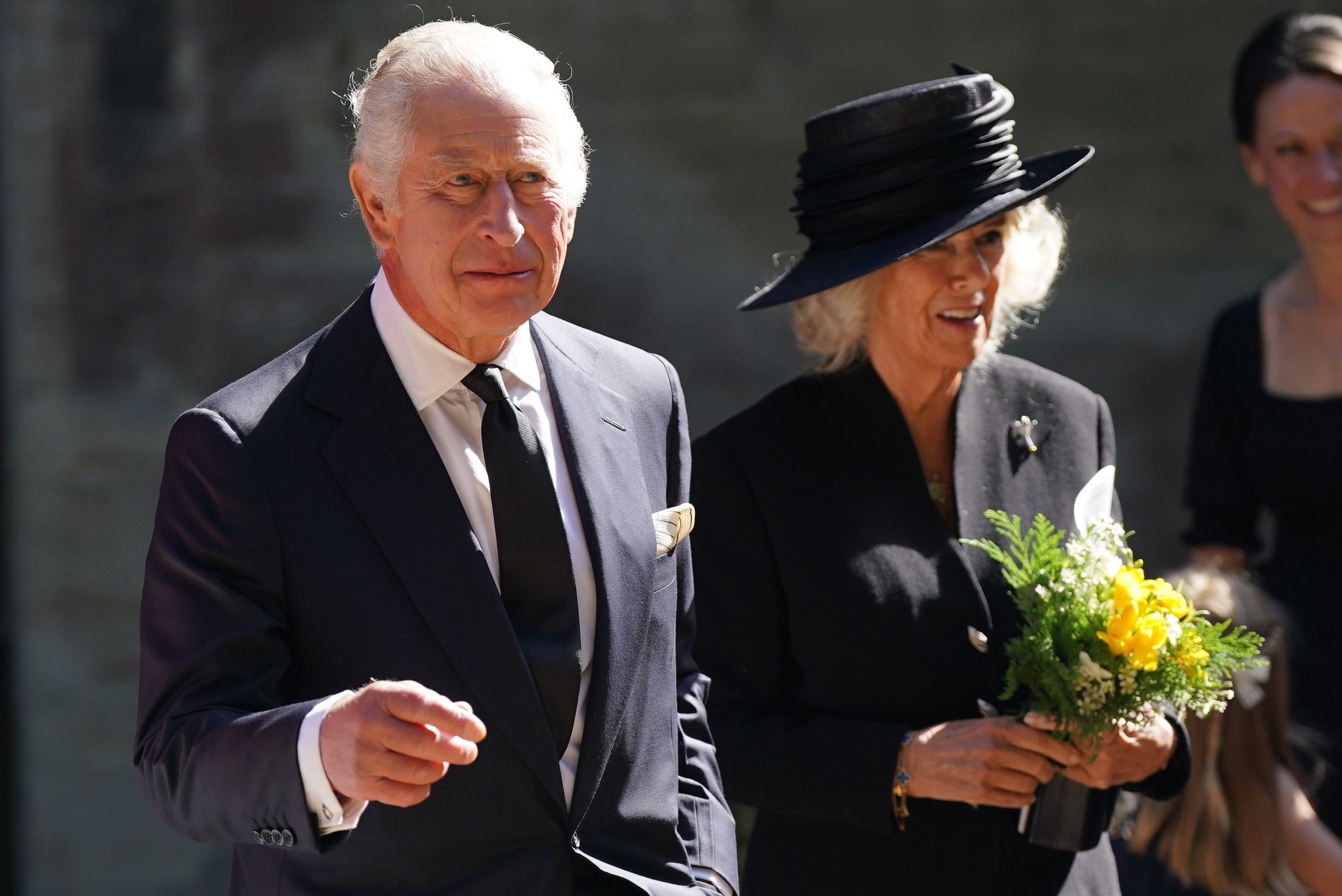 Britain's King Charles III and Camilla, the Queen Consort, leave following a Service of Prayer and Reflection for the life of Queen Elizabeth II, at Llandaff Cathedral in Cardiff, Wales, Friday.