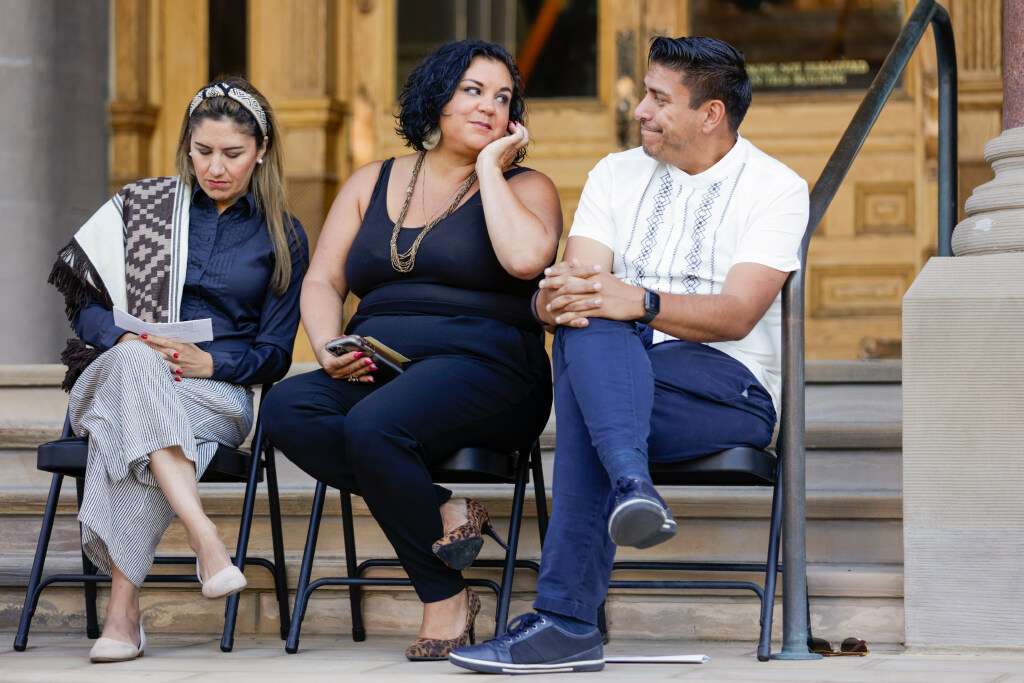 Salt Lake City Council members Ana Valdemoros, left, Victoria Petro-Eschler and Alejandro Puy attend an event marking the start of Hispanic Heritage Month at the Salt Lake City-County Building in Salt Lake City on Friday.