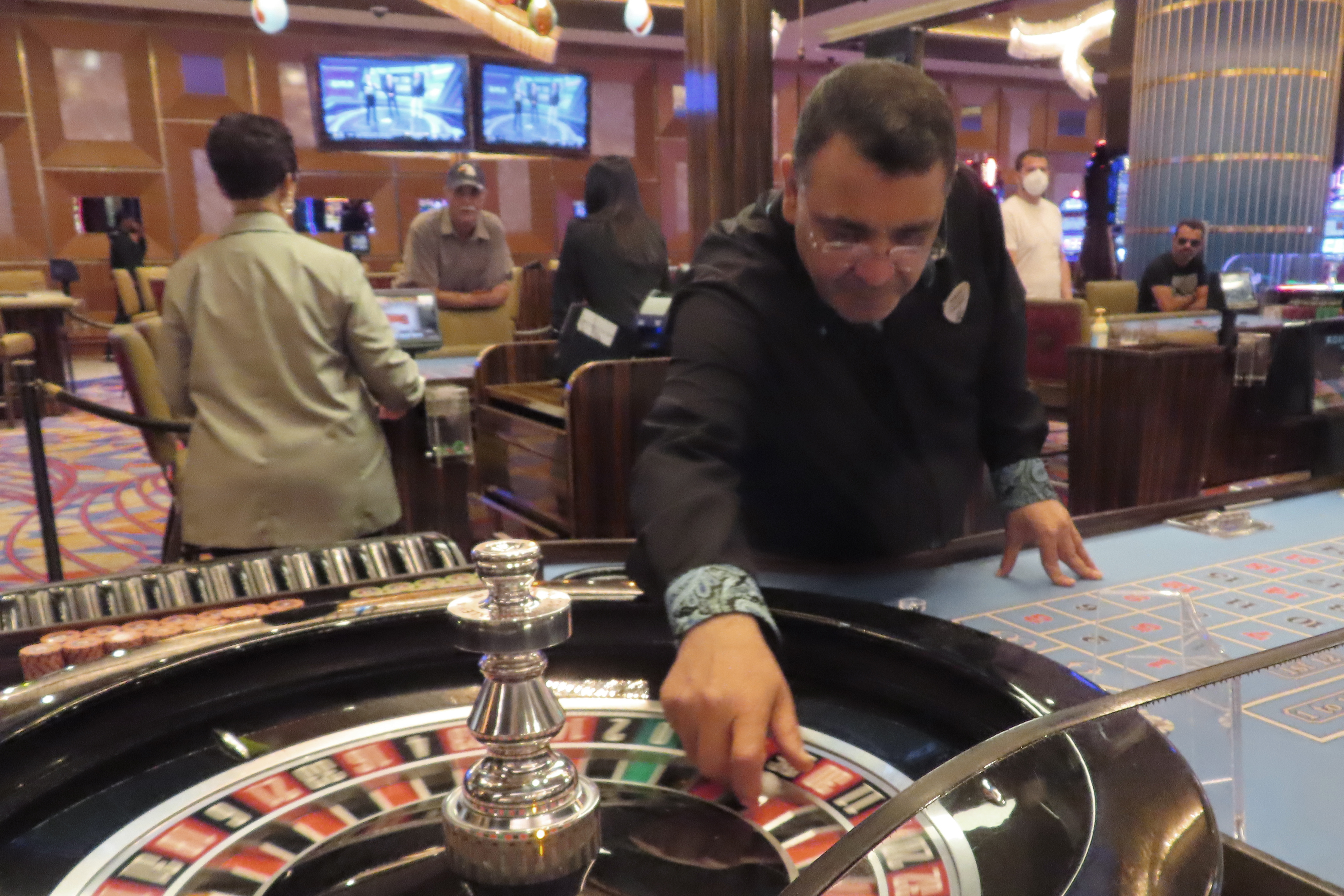 A dealer prepared to spin the ball during a game of roulette at the Hard Rock casino in Atlantic City N.J. on Aug. 8, 2022. On Sept. 16, 2022, New Jersey gambling regulators reported that the state's casinos, horse tracks that offer sports betting and the online partners of both types of gambling outlets won $470.6 million from gamblers in August, up nearly 10% from a year earlier. 