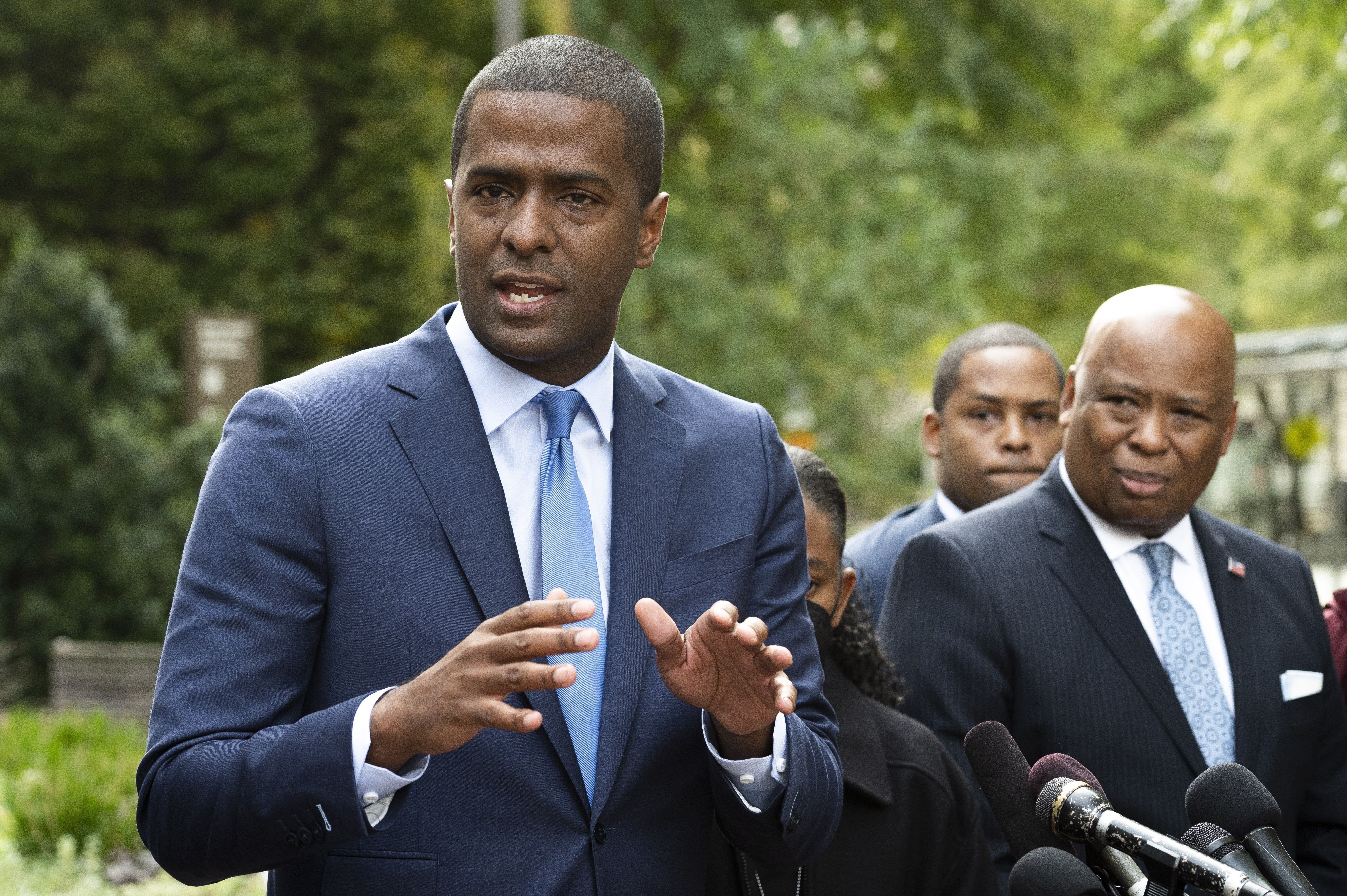 FILE - Bakari Sellers, the attorney for the families of victims killed in the 2015 Mother Emanuel AME Church massacre, speaks with reporters outside the Justice Department, in Washington, Thursday, Oct. 28, 2021. A lawsuit alleging the rampant sexual abuse of underage athletes at a competitive cheerleading gym in South Carolina has been amended to name six more coaches as defendants and three more accusers. One of the plaintiffs' lawyers, Bakari Sellers, likened the case to that of Larry Nassar, the former USA Gymnastics and Michigan State University doctor. 
