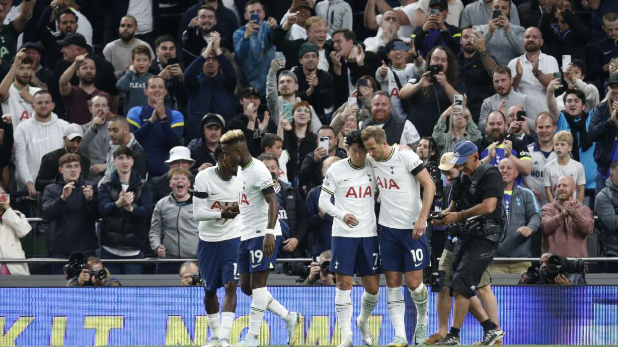 Tottenham's Son Heung-min celebrates with teammates after scoring during the English Premier League soccer match between Tottenham Hotspur and Leicester City at Tottenham Hotspur Stadium, in London, Saturday, Sept. 17, 2022.