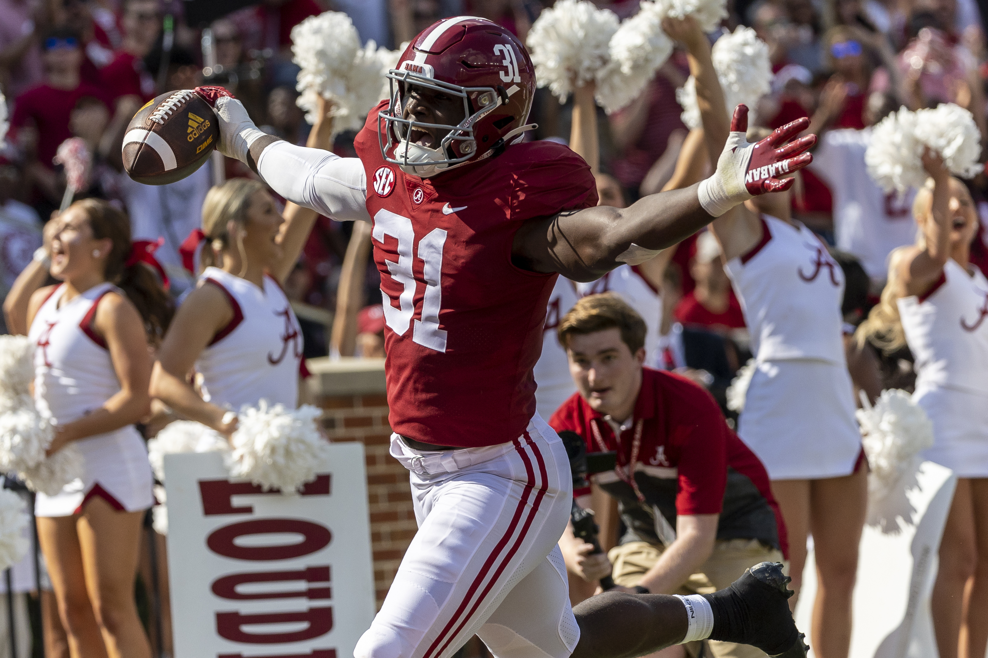 Alabama linebacker Will Anderson Jr. (31) runs back an interception for a touchdown against Louisiana-Monroe during the first half of an NCAA college football game, Saturday, Sept. 17, 2022, in Tuscaloosa, Ala.