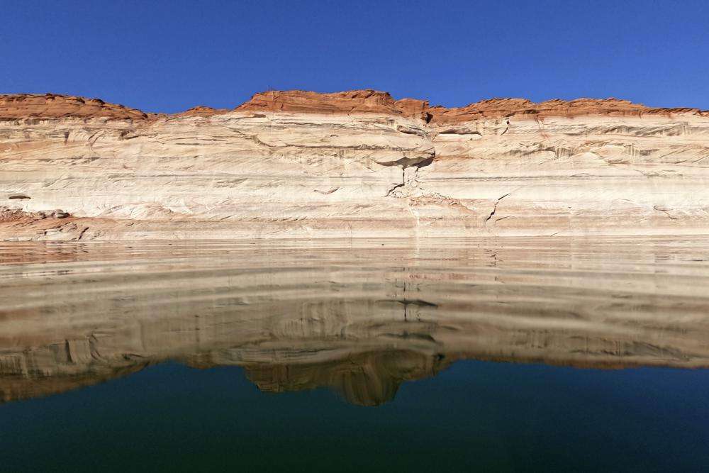 Bathtub rings show how low Lake Powell levels have declined June 8 in Page, Ariz. As America's large reservoirs on the Colorado River drop to record-low levels, fish are among those suffering the impact.
