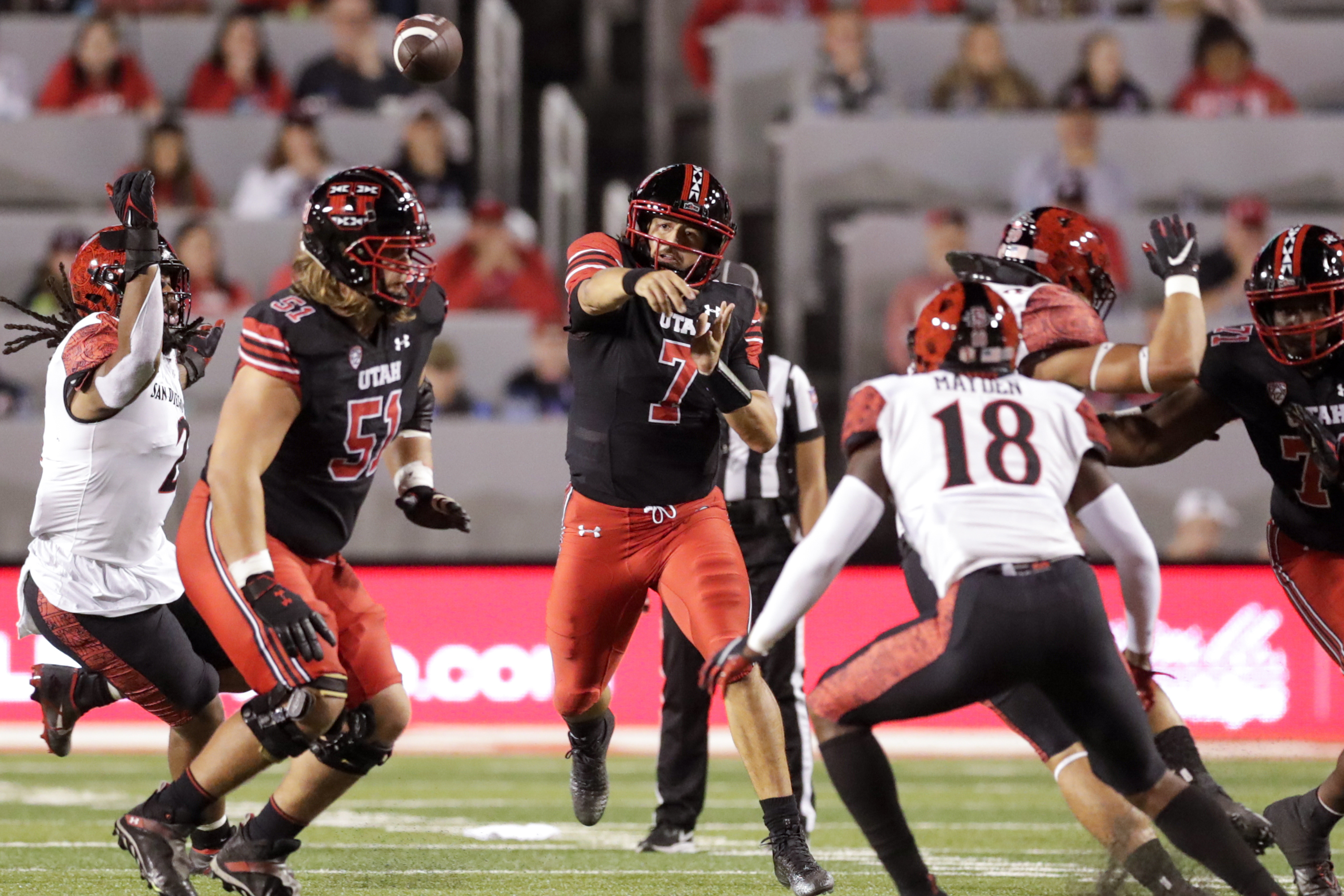 Cameron Rising (7) of the Utah Utes throws the ball while playing the San Diego State Aztecs in Salt Lake City on Saturday, Sept. 17, 2022.