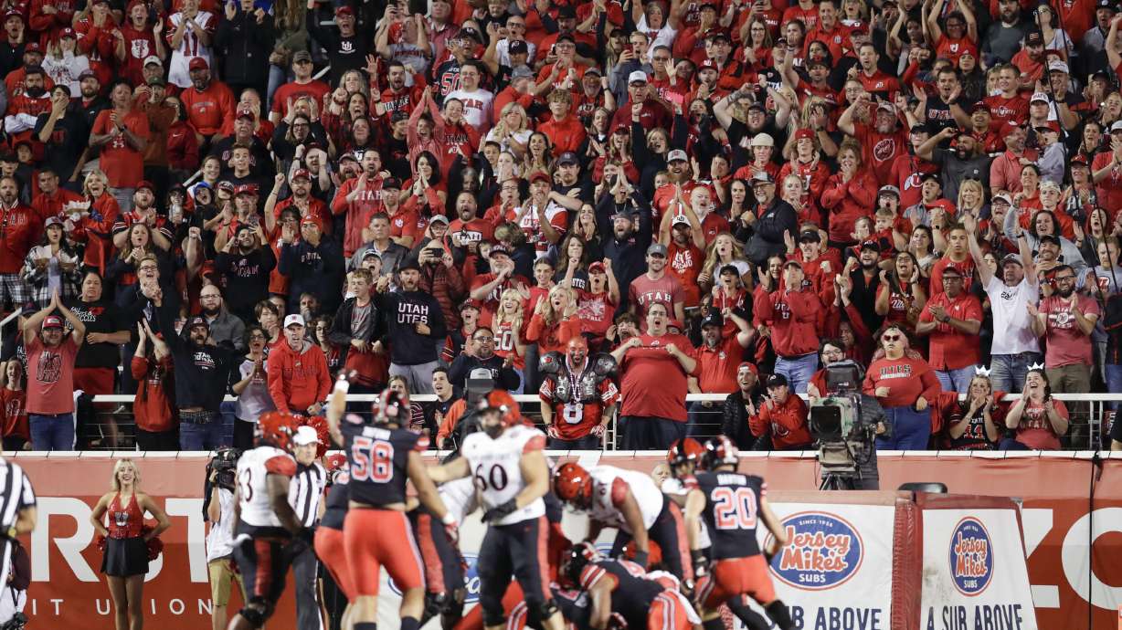 The student section of the Utah Utes cheers in Salt Lake City on Sept. 17. A University of Utah student was arrested Wednesday after police say she threatened to detonate a nuclear reactor if the Utes didn't win on Saturday.
