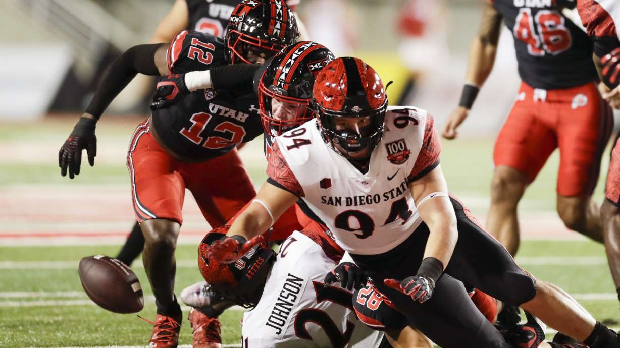 The San Diego State Aztecs fumble the ball after receiving it during a kick and the ball is recovered by the Utah Utes in Salt Lake City on Saturday, Sept. 17, 2022. in Salt Lake City on Saturday, Sept. 17, 2022.