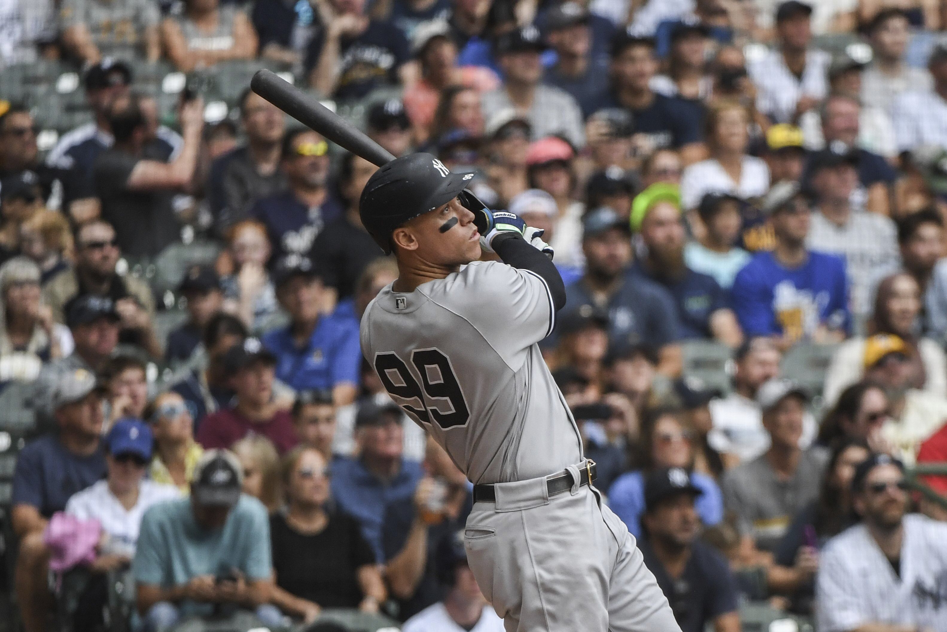 New York Yankees' Aaron Judge hits his fifty eighth homerun during the third inning of a baseball game against the Milwaukee Brewers Sunday, Sept. 18, 2022, in Milwaukee. 