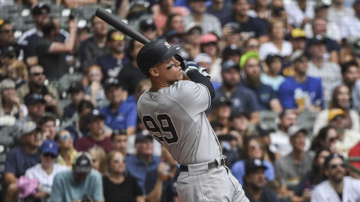 New York Yankees' Aaron Judge hits his fifty eighth homerun during the third inning of a baseball game against the Milwaukee Brewers Sunday, Sept. 18, 2022, in Milwaukee.