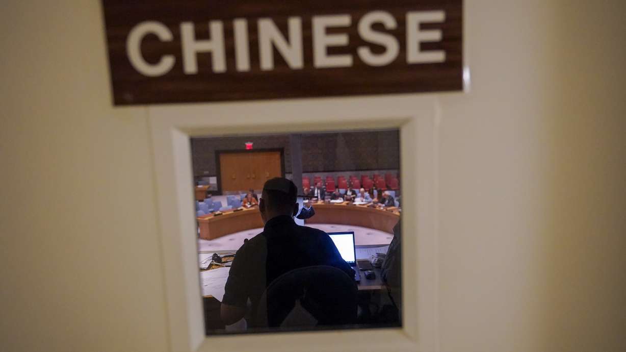 A Chinese translator works during a Security Council meeting at United Nations headquarters ahead of the General Assembly, Friday. As world leaders gather in New York at the annual U.N. General Assembly, rising superpower China is also focusing on another United Nations body that is meeting across the Atlantic Ocean in Geneva.