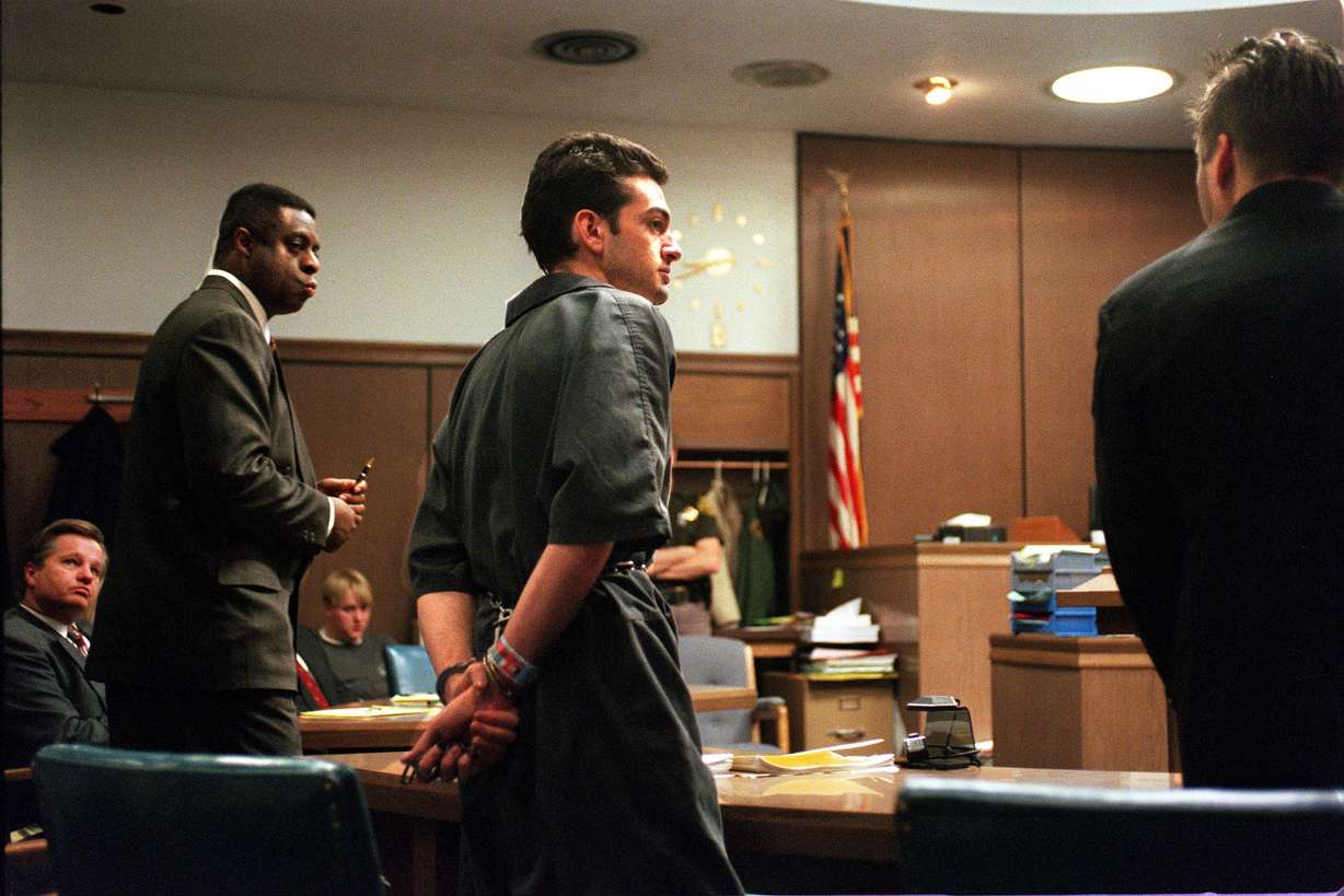 Jorge Benvenuto walks to the front of the courtroom with his lawyers during sentencing for the murder of Zachary Snarr on Jan. 30, 1998.