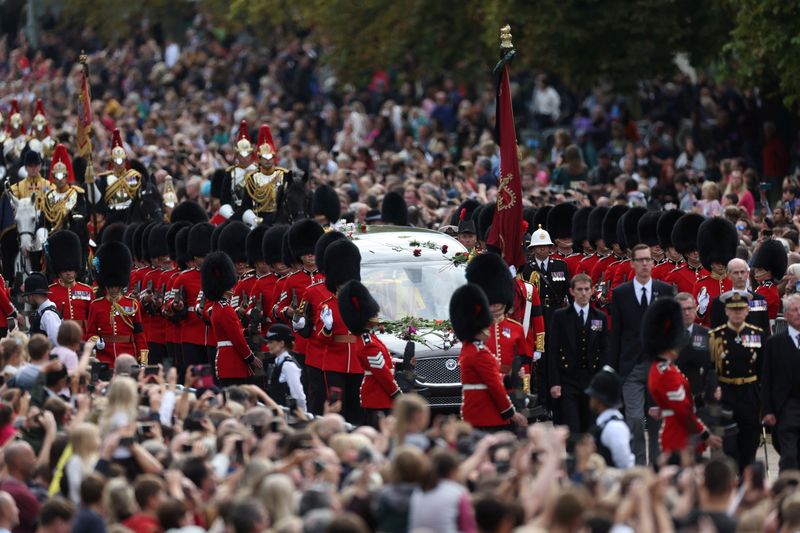 The hearse travels along the Long Walk as it makes its way to Windsor Castle, on the day of the state funeral and burial of Britain's Queen Elizabeth, in Windsor, Britain, on Monday.