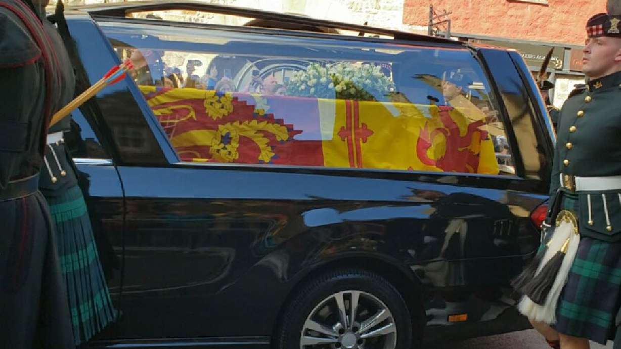 Queen Elizabeth II’s casket is seen being taken to St. Giles Cathedral to lie in state.