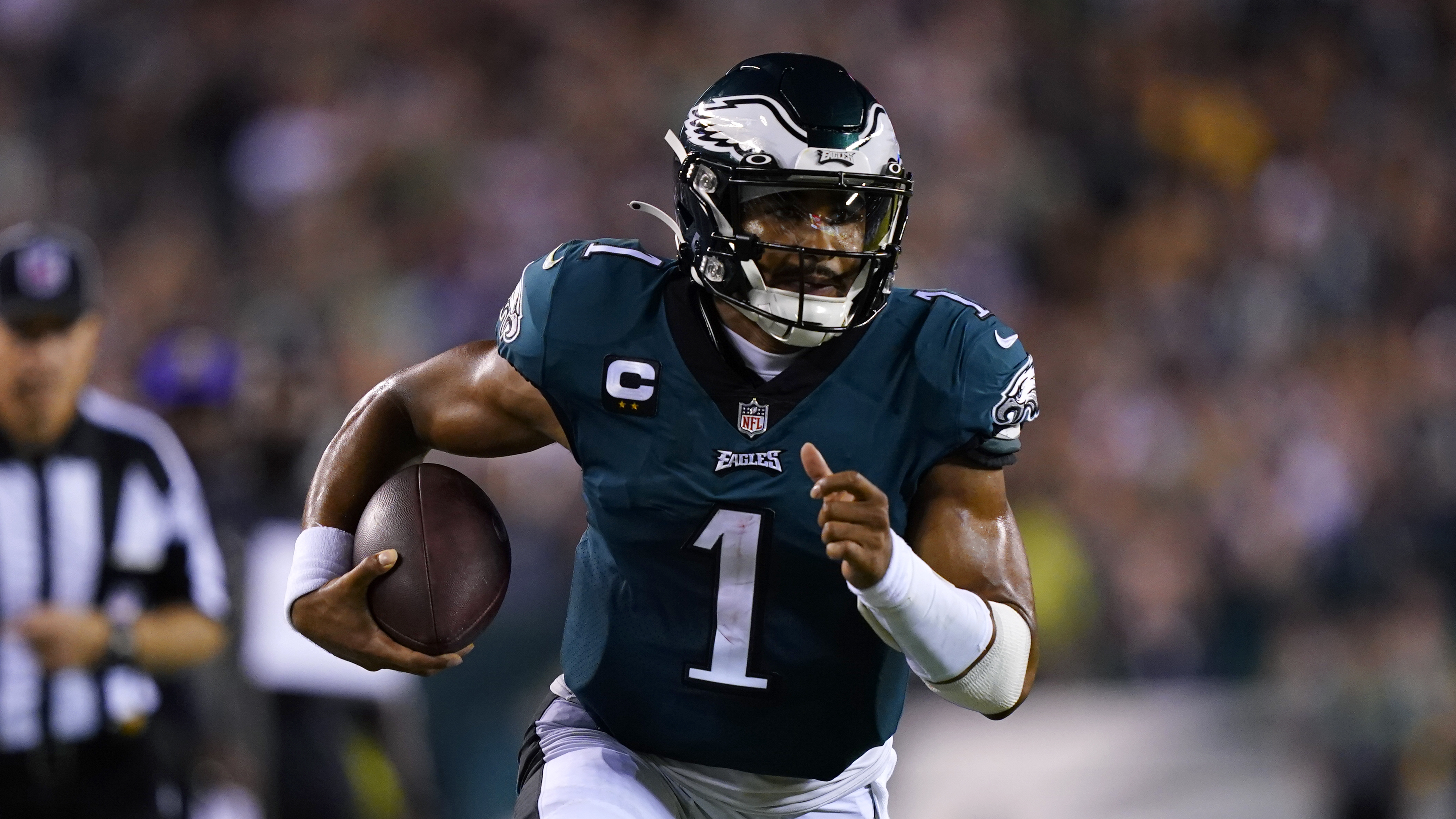 Philadelphia Eagles quarterback Jalen Hurts (1) runs up field during the first half of an NFL football game against the Minnesota Vikings, Monday, Sept. 19, 2022, in Philadelphia. 