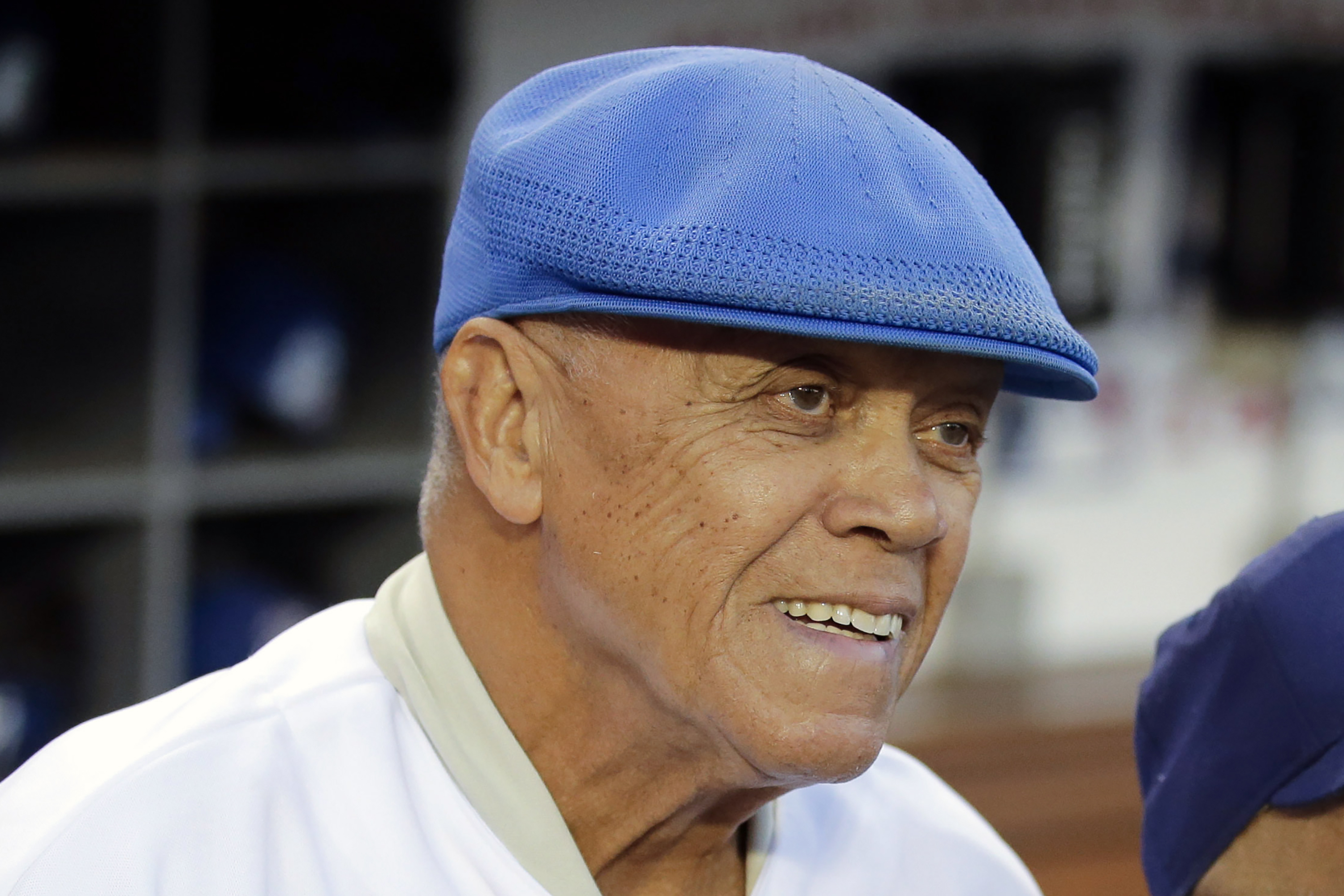 FILE - Former Los Angeles Dodgers shortstop Maury Wills is shown before Game 2 of baseball's NL Division Series between the Dodgers and the St. Louis Cardinals in Los Angeles, Saturday, Oct. 4, 2014. Maury Wills, who helped the Los Angeles Dodgers win three World Series titles with his base-stealing prowess, has died. The team says Wills died Monday night, Sept. 19, 2022, in Sedona, Ariz. He was 89.