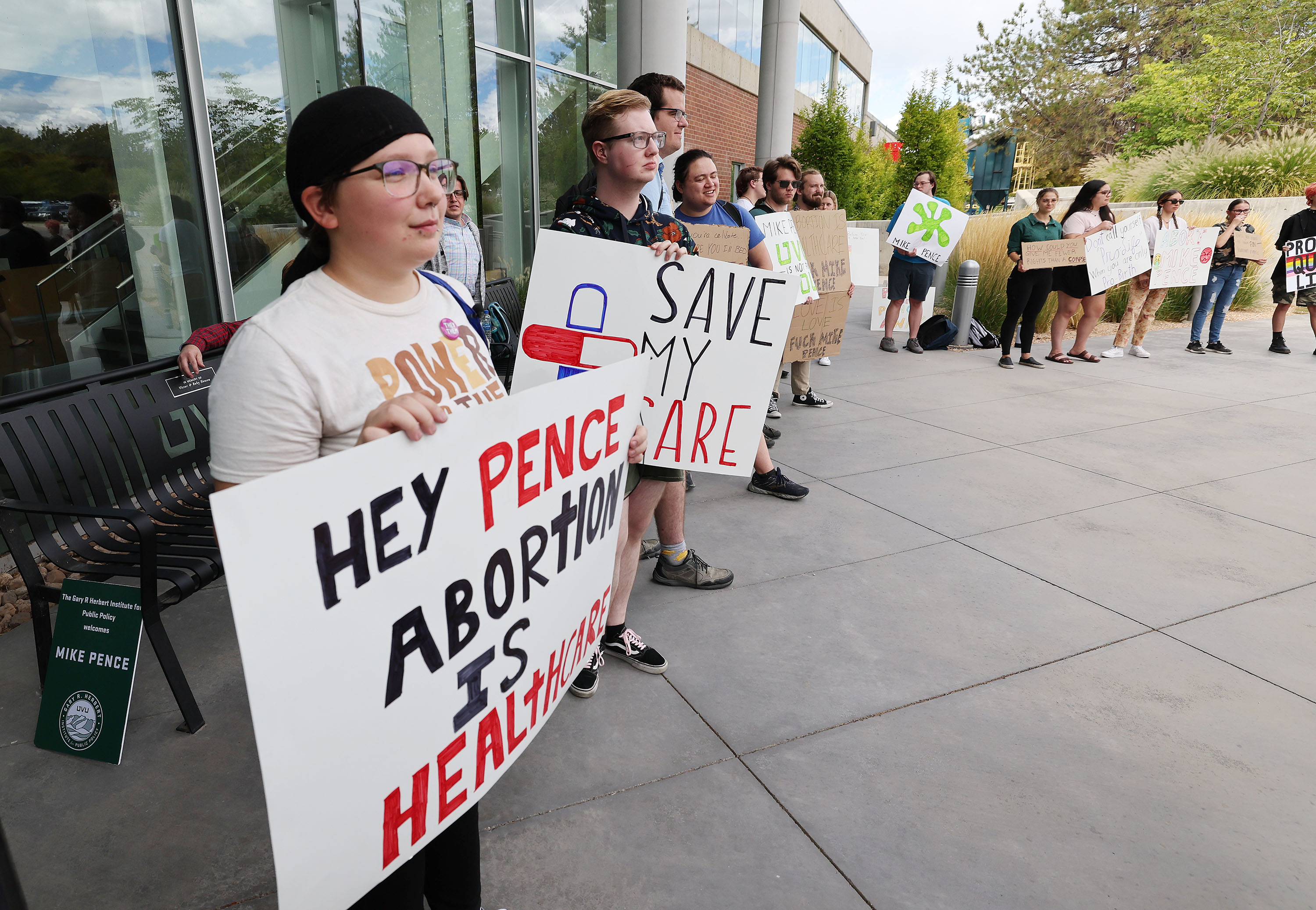 Students protest as former Vice President Mike Pence speaks at Utah Valley University in Orem on Tuesday. Pence visited the Beehive State Tuesday to speak to a packed audience at Utah Valley University's Gary R. Herbert Institute for Public Policy Fall Forum.