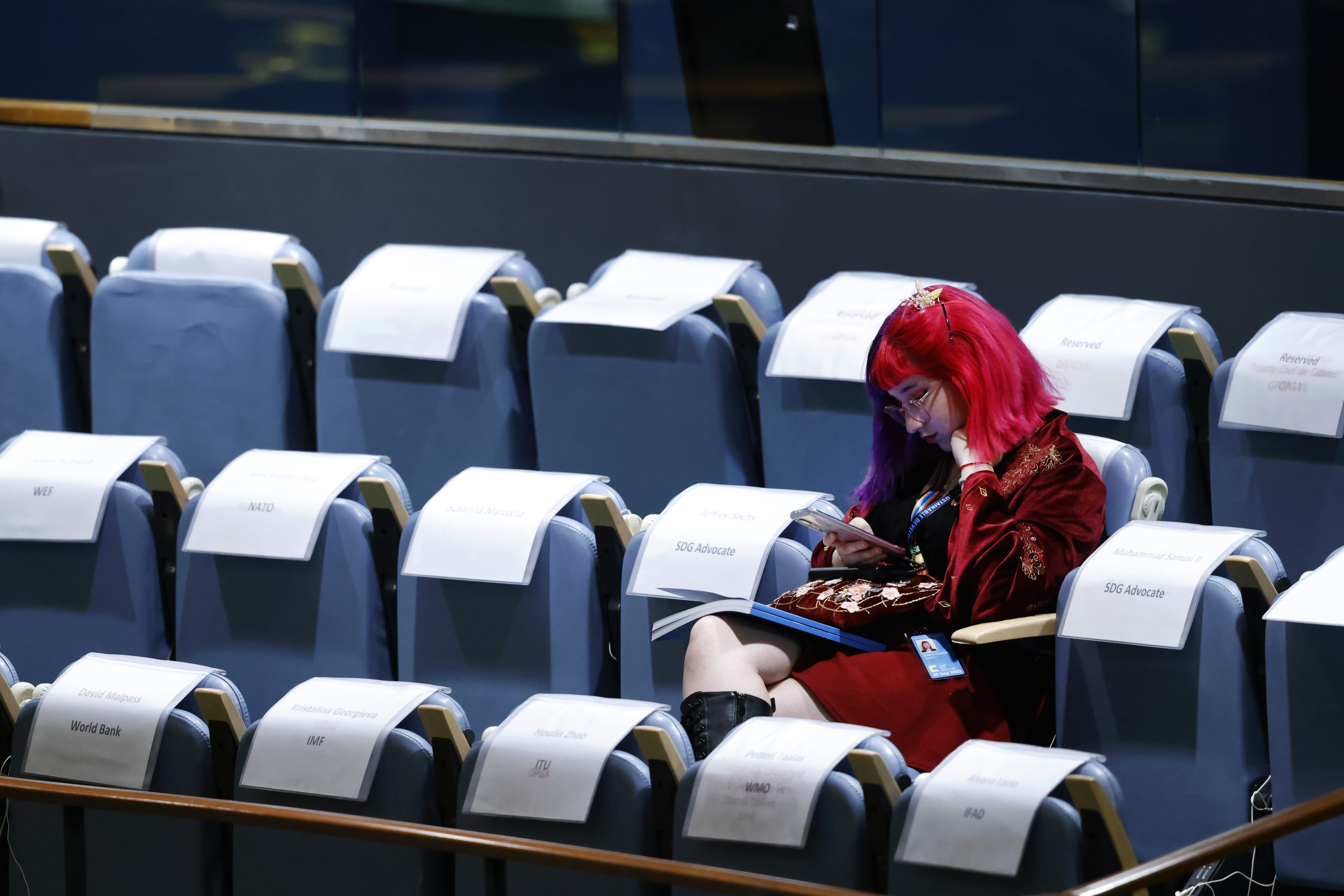 An attendee sits in the gallery during the 77th session of the United Nations General Assembly, at U.N. headquarters, Tuesday.