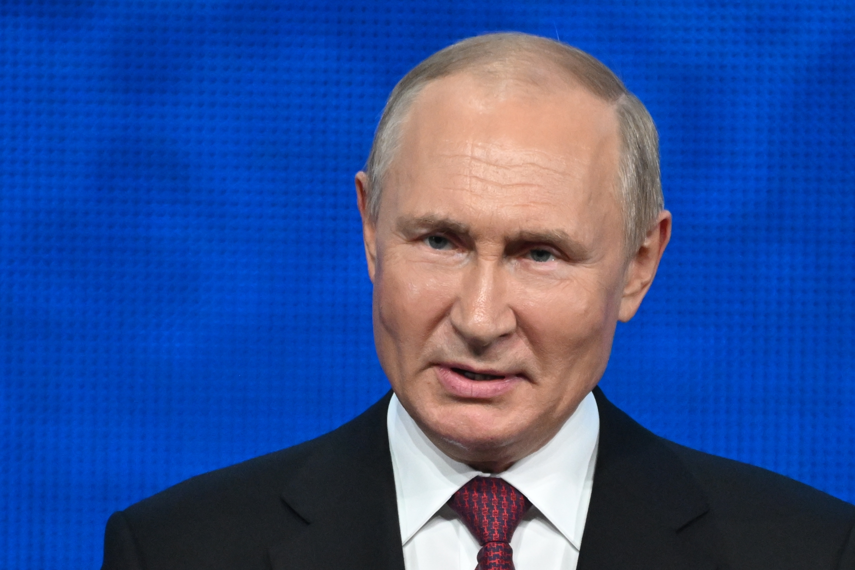 Russian President Vladimir Putin addresses an event at the State Kremlin Palace in Moscow on Tuesday. Putin has ordered a partial mobilization of reservists in Russia. It's an unpopular step that sparked rare protests across the country and led to almost 1,200 arrests.