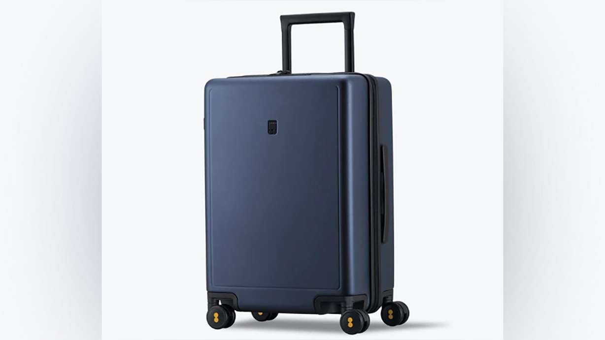 LEVEL8 textured carry-on 20-inch rolling
suitcase.