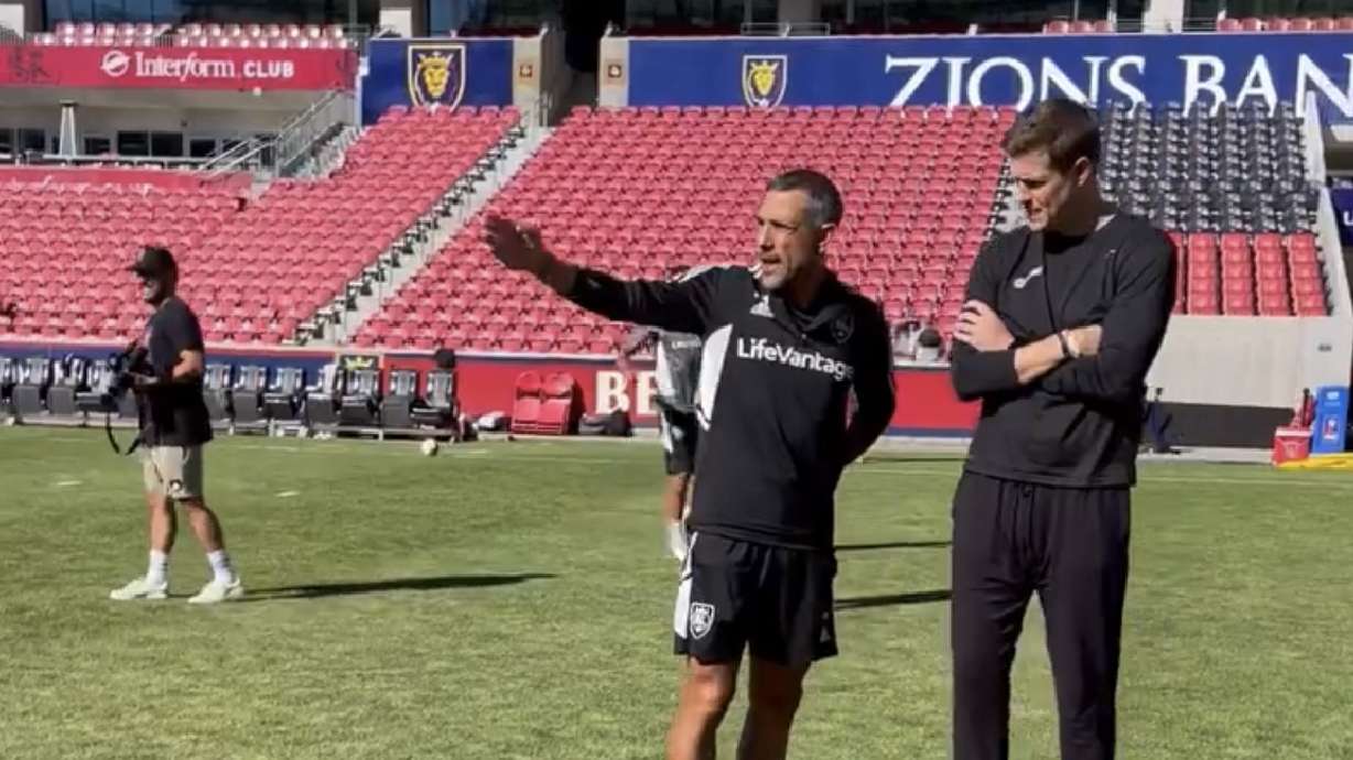 RSL head coach Pablo Mastroeni speaks with Jazz head coach Will Hardy at a joint team practice Wednesday.