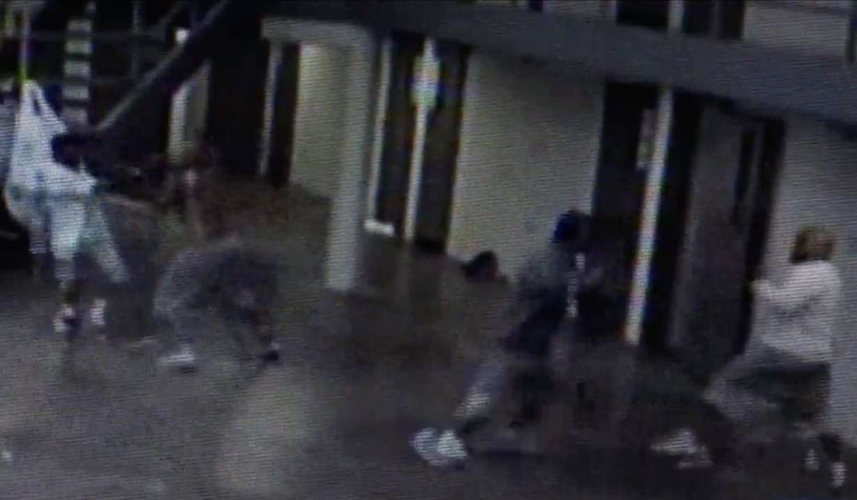 Grainy video captured by surveillance cameras inside the former state prison in Draper, and captured by KSL-TV in open court, shows cell doors pop open. Seconds later, the fighting starts.