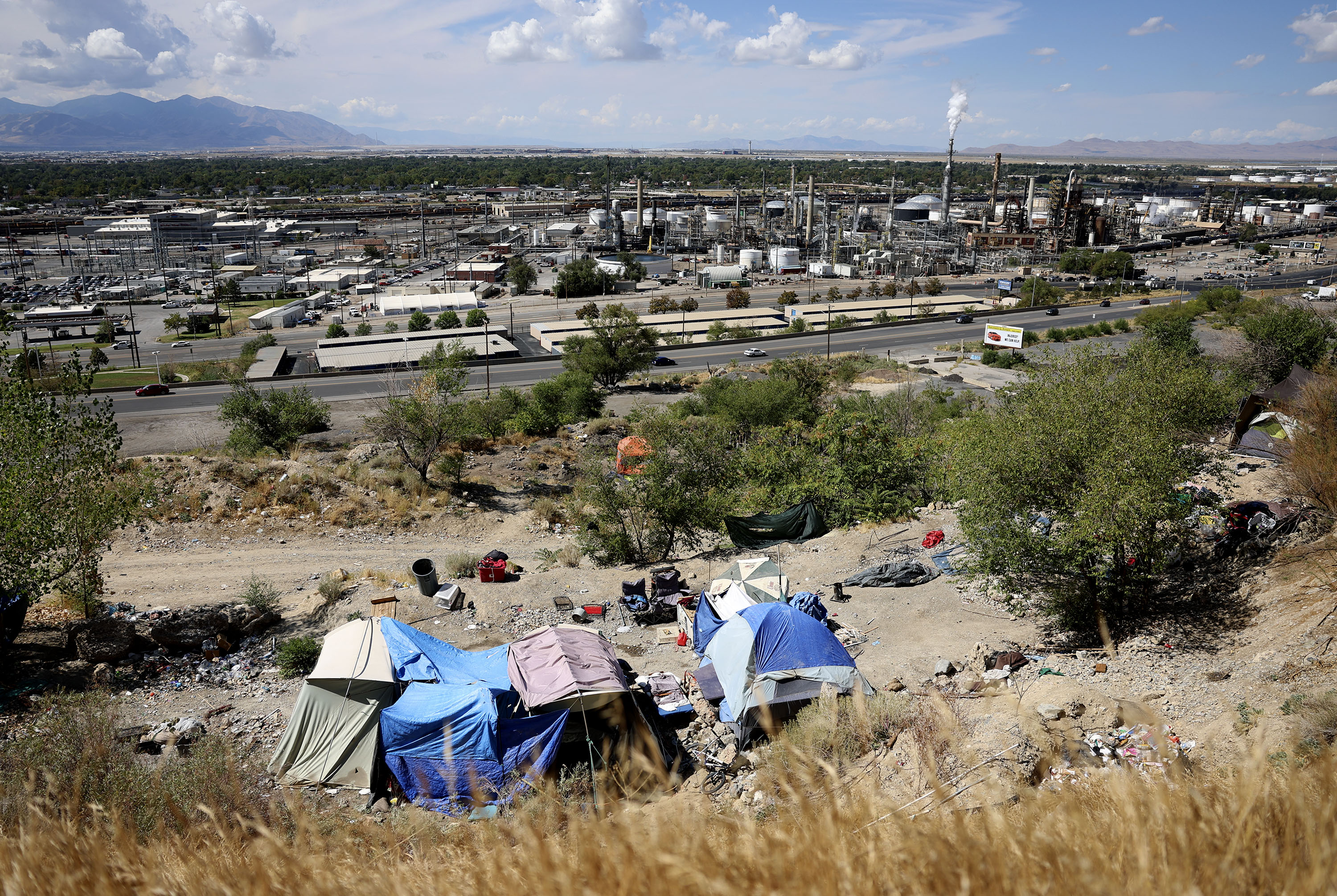 Homeless camps overlook Victory Road in Salt Lake City. The City Council voted Tuesday to approve a new process to establish homeless resource centers in the city.