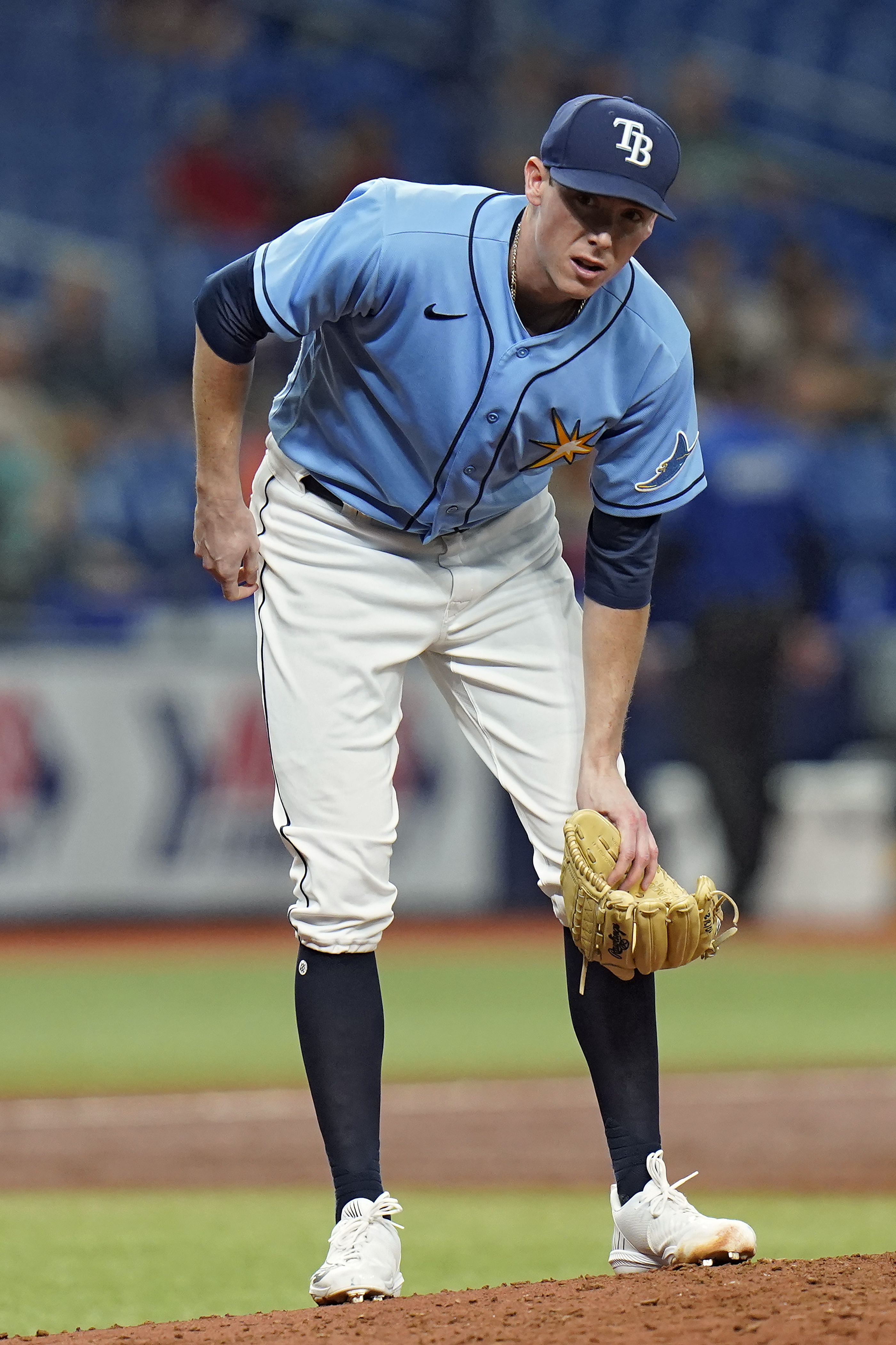 Tampa Bay Rays pitcher Ryan Yarbrough reacts after getting hurt during the third inning of a baseball game against the Toronto Blue Jays Thursday, Sept. 22, 2022, in St. Petersburg, Fla. Yarbrough left the game. 