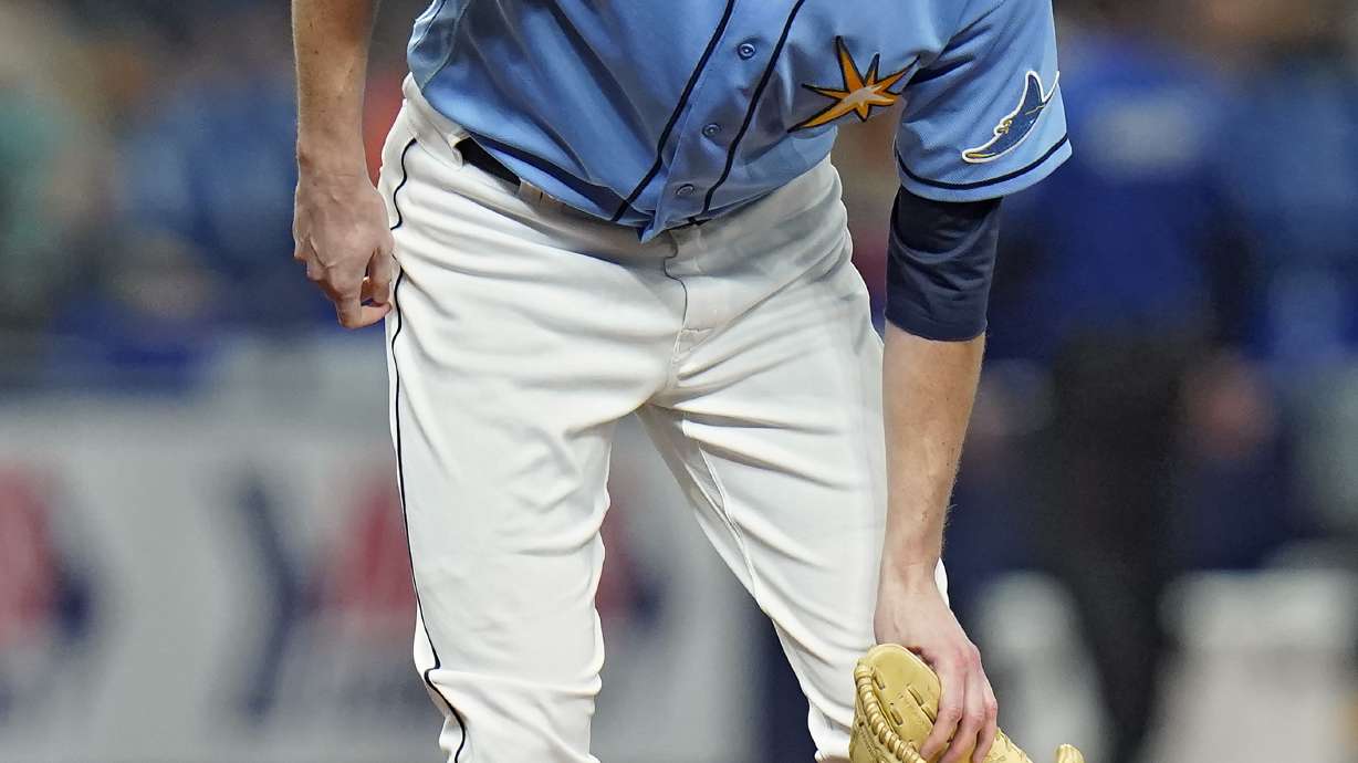 Tampa Bay Rays pitcher Ryan Yarbrough reacts after getting hurt during the third inning of a baseball game against the Toronto Blue Jays Thursday, Sept. 22, 2022, in St. Petersburg, Fla. Yarbrough left the game.