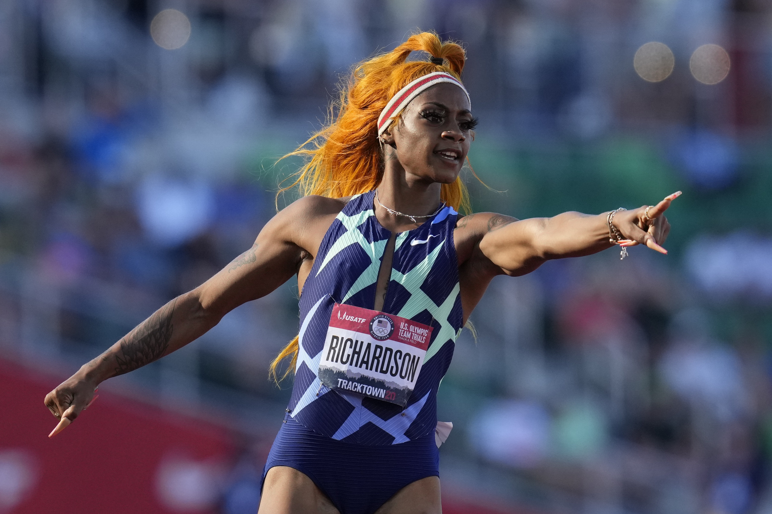FILE - United States sprinter Sha'Carri Richardson celebrates after winning the first heat of the semis finals in women's 100-meter run at the U.S. Olympic Track and Field Trials on June 19, 2021, in Eugene, Ore. Cannabis use will stay banned at sports events after the World Anti-Doping Agency on Friday Sept. 23, 2022 resisted calls to change its status on the list of prohibited substances. The agency was asked to review the status of THC after the case of Richardson, who did not go to the Tokyo Olympics last year. She served a one-month ban on testing positive at the trials meet where she won the 100 meters. 