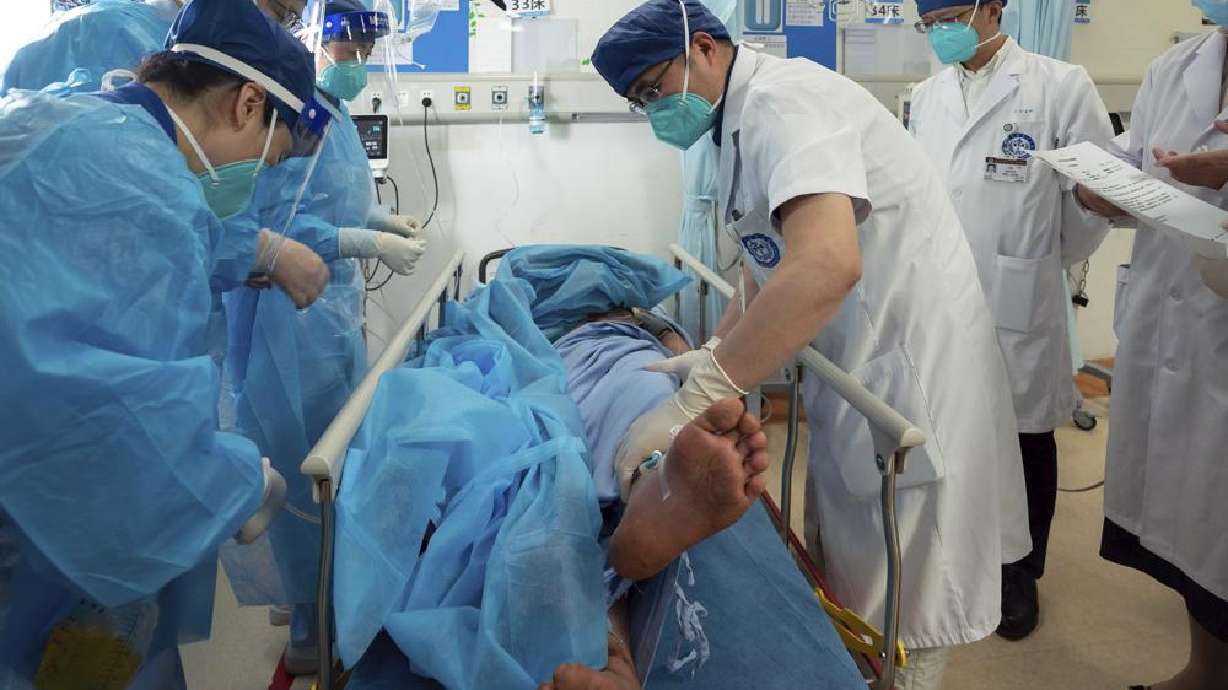 A hydropower station worker who had gone missing for 17 days after an earthquake, lies on the backseat of a helicopter after he was found and evacuated to Luding County in southwestern China's Sichuan Province on Wednesday.