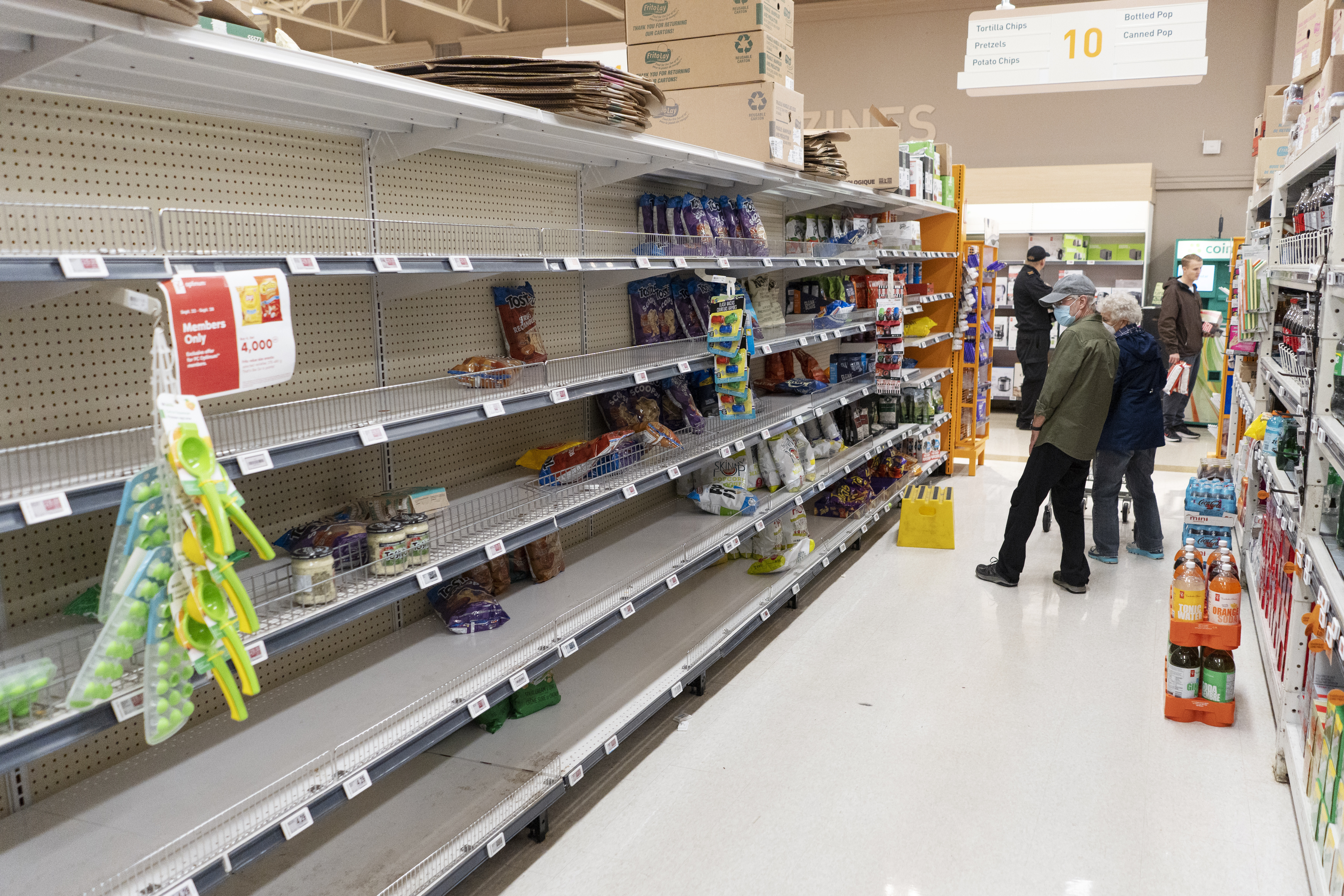 Empty shelves are seen in a grocery store as shoppers stock up on food in advance of Hurricane Fiona making landfall in Halifax on Friday.