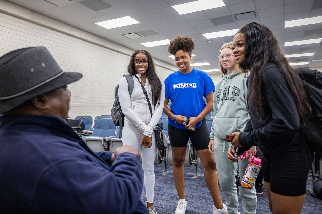 Two members of Wyoming's Black 14, John Griffin and Mel Hamilton, and Elder Gifford Nielsen visit with members of the BYU athletic department for a Q&A session after screening the documentary The Black 14: Healing Hearts and Feeding Souls, Wednesday, Sept. 21, 2022 in Provo.