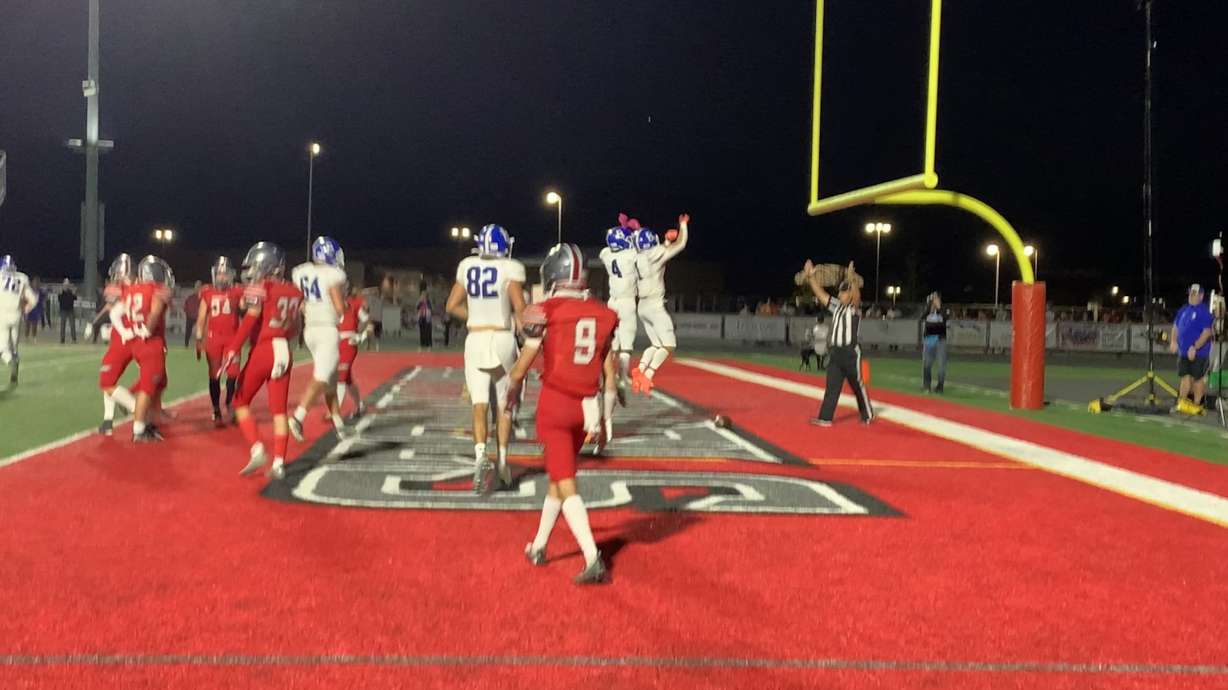 Bingham celebrates a touchdown during its 24-13 win over Mountain Ridge.