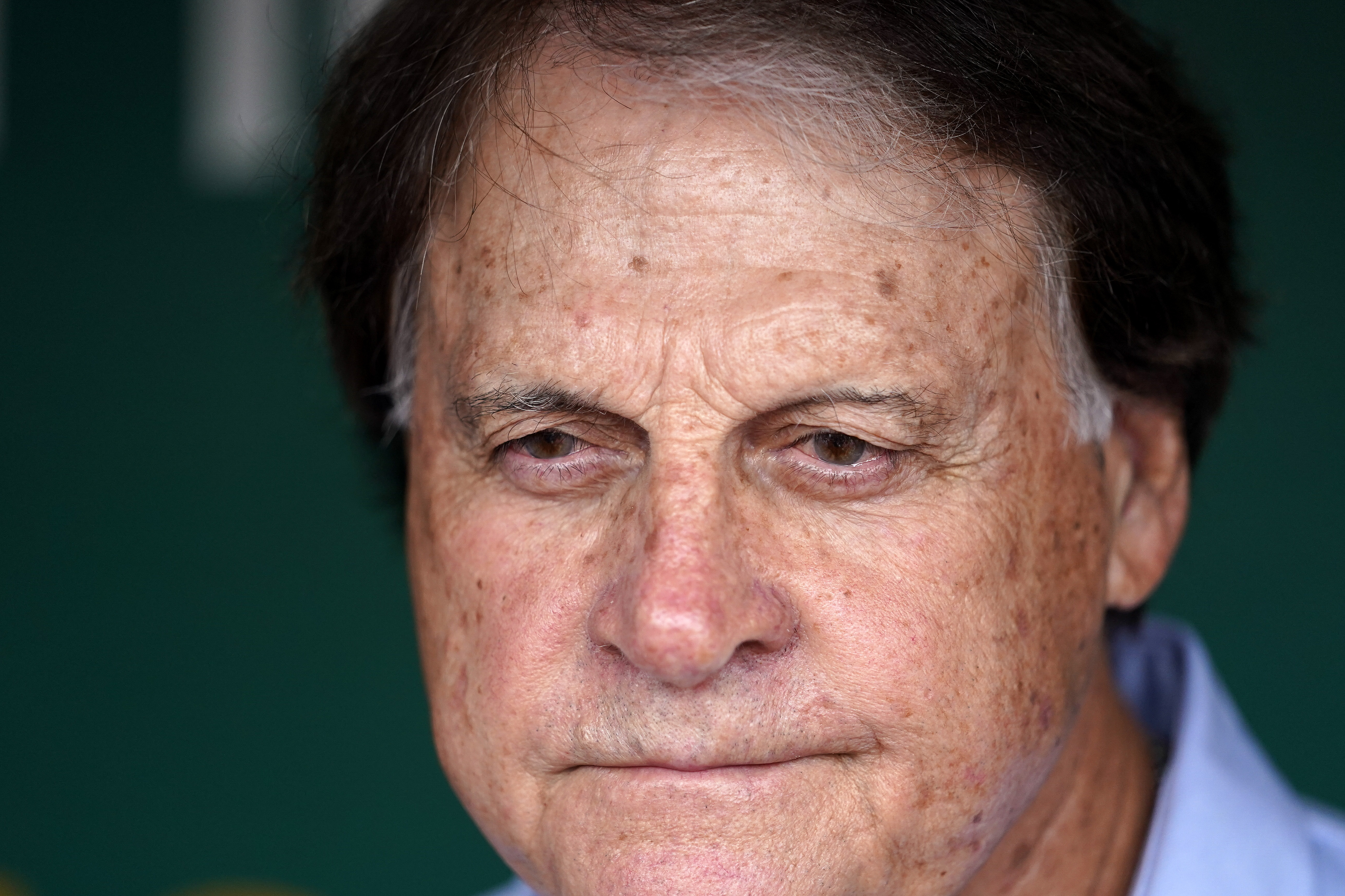 Chicago White Sox manager Tony La Russa talks to reporters in the dugout before a baseball game against the Oakland Athletics in Oakland, Calif., Sunday, Sept. 11, 2022. 