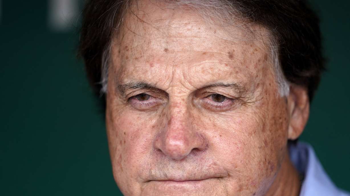 Chicago White Sox manager Tony La Russa talks to reporters in the dugout before a baseball game against the Oakland Athletics in Oakland, Calif., Sunday, Sept. 11, 2022.