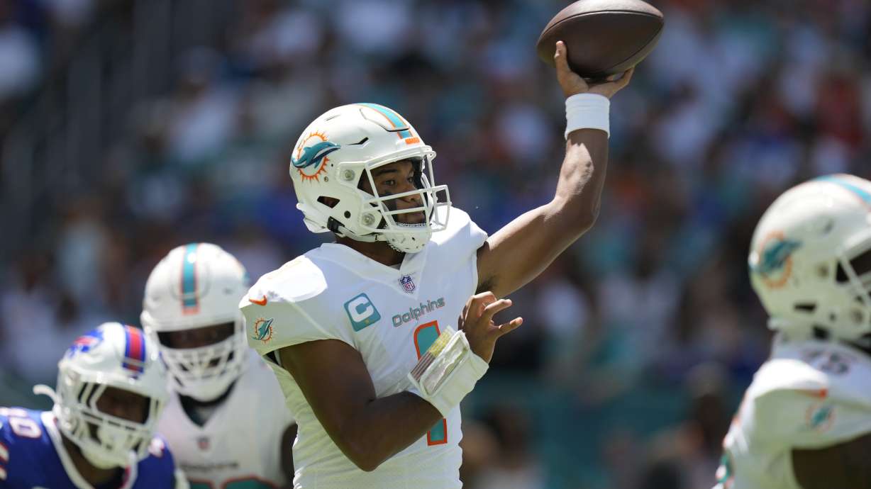 Miami Dolphins quarterback Tua Tagovailoa (1) aims a pass during the first half of an NFL football game against the Buffalo Bills, Sunday, Sept. 25, 2022, in Miami Gardens.