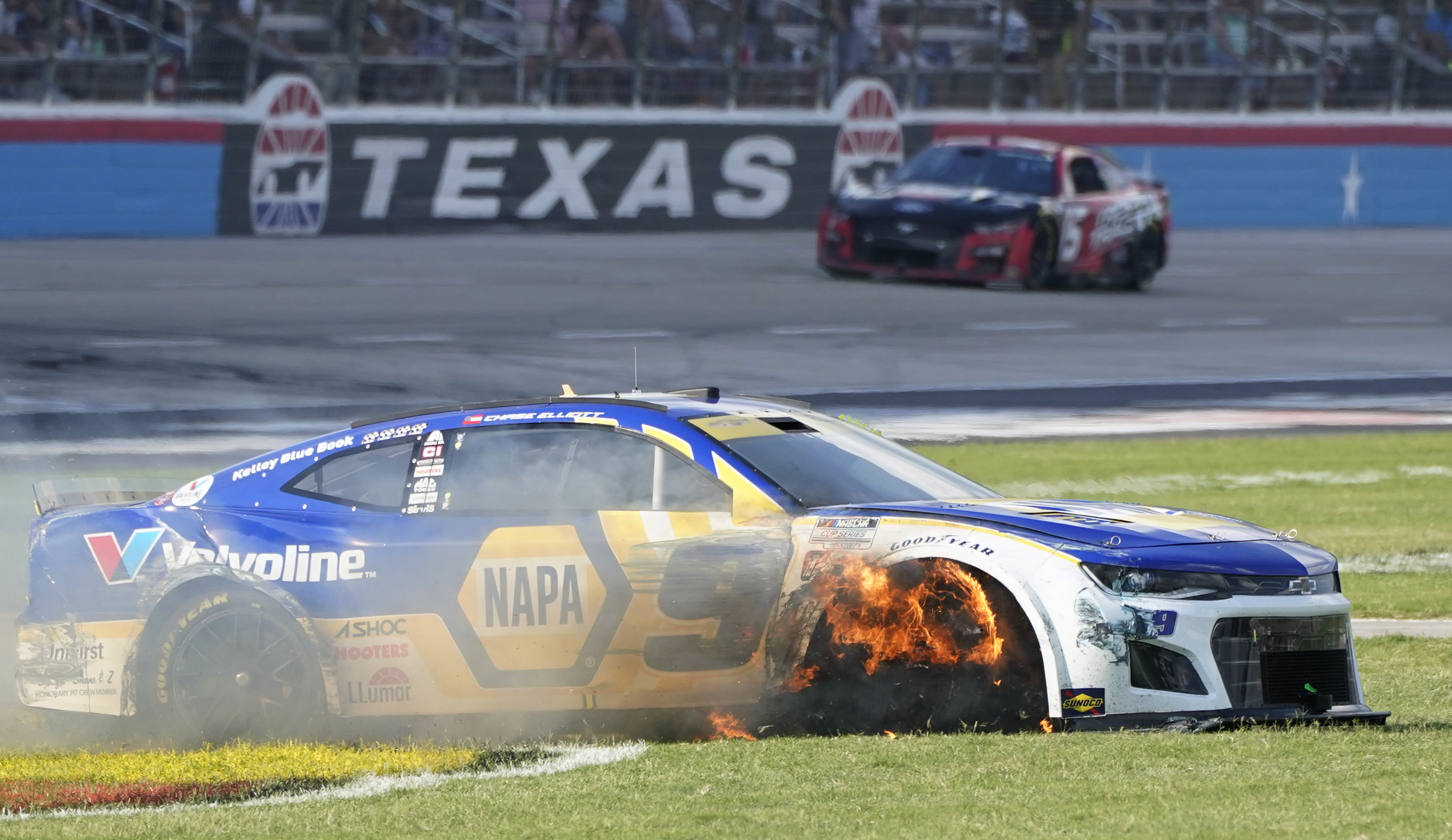 Chase Elliott's tire burns after he contacted the wall during the NASCAR Cup Series auto race at Texas Motor Speedway in Fort Worth, Texas, Sunday, Sept. 25, 2022. 