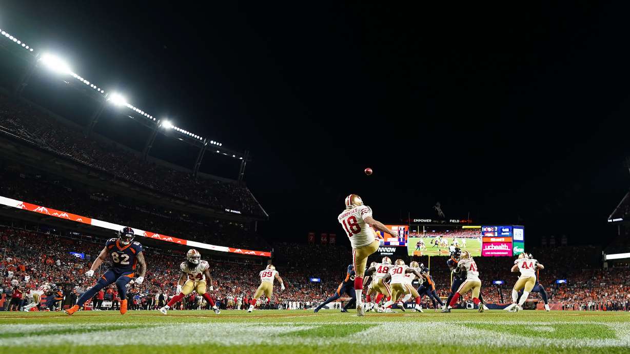 San Francisco 49ers punter Mitch Wishnowsky (18) punts during the first half of an NFL football game against the Denver Broncos in Denver, Sunday, Sept. 25, 2022.