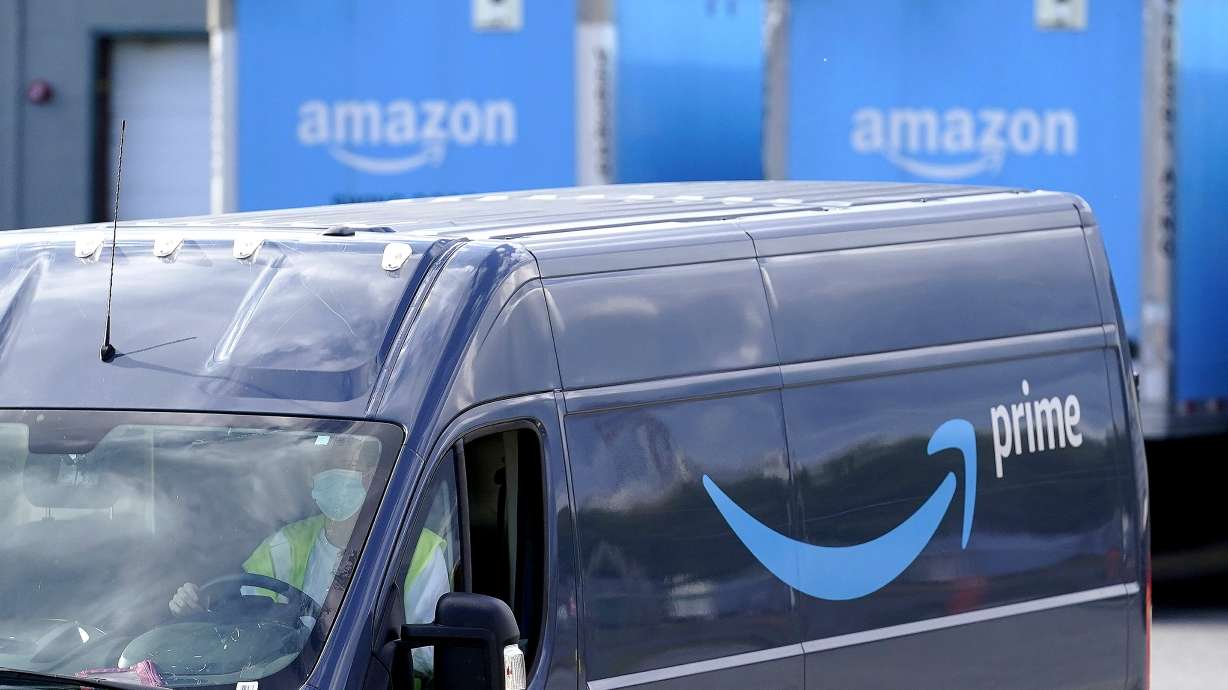 An Amazon Prime logo appears on a delivery van in Dedham, Mass., Oct. 1, 2020. Amazon is holding a second Prime Day-like shopping event in October 2022.